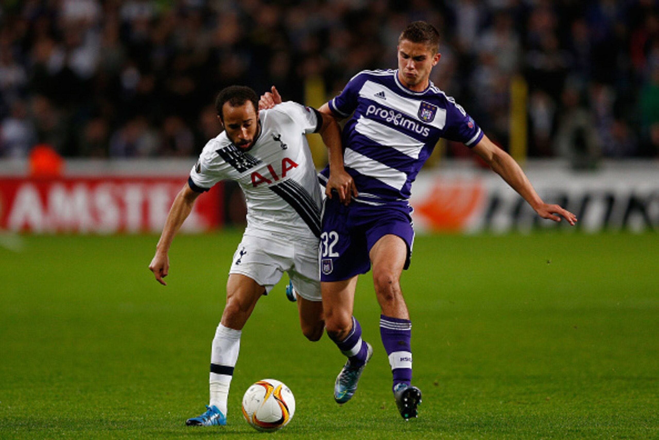 BRUSSELS, BELGIUM - OCTOBER 22:  Andros Townsend of Spurs is challenged by Leander Dendoncker of Anderlecht during the UEFA Europa League Group J match between RSC Anderlecht and Tottenham Hotspur FC at the Constant Vanden Stock Stadium on October 22, 201