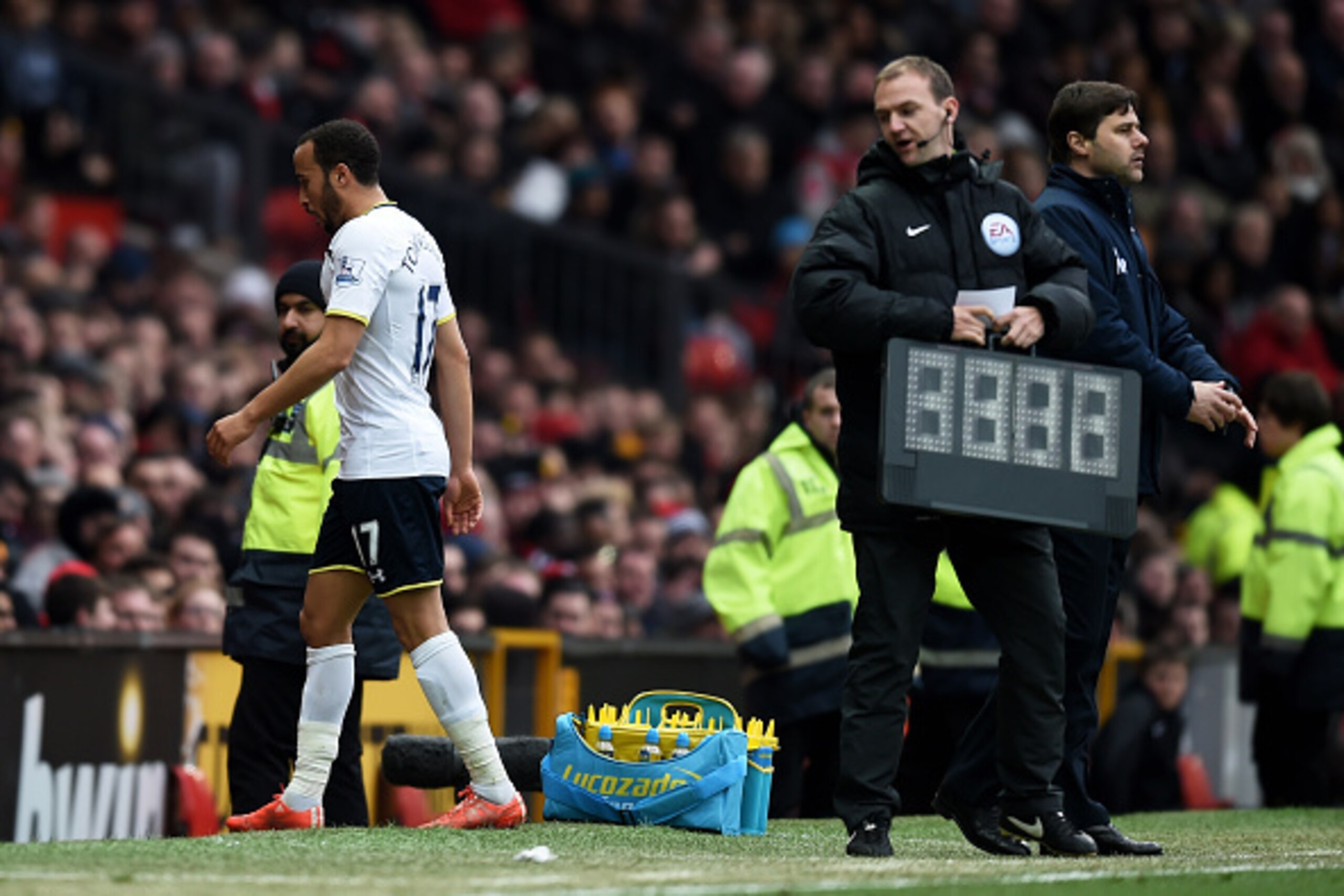 MANCHESTER, ENGLAND - MARCH 15:  Andros Townsend of Spurs walks off the pitch after being substituted by Mauricio Pochettino the manager of Spurs following a torrid opening period during the Barclays Premier League match between Manchester United and Tott
