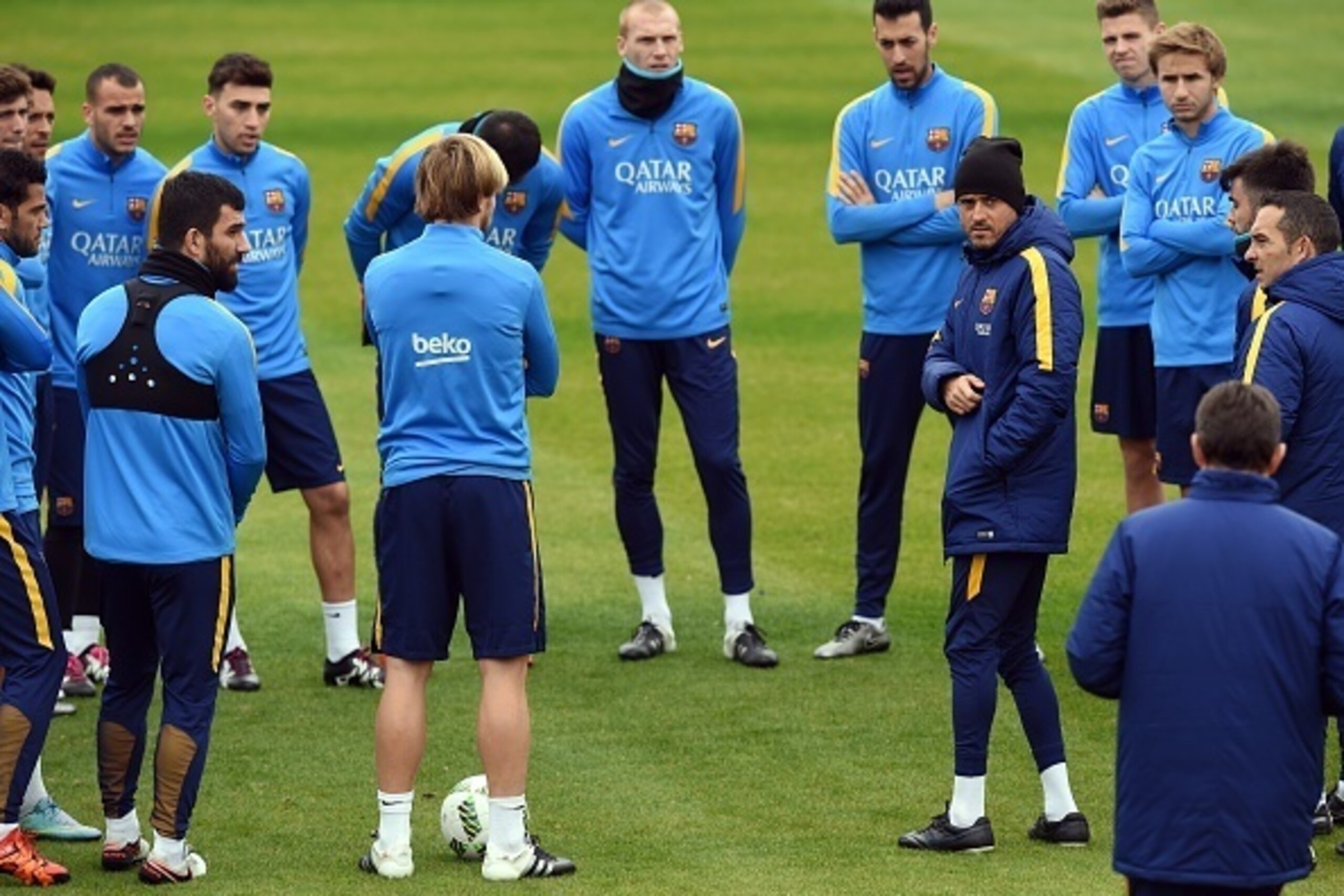 FC Barcelona head coach Luis Enrique (6th R) looks behind prior to the start of his team's training session at the Club World Cup football tournament in Yokohama on December 15, 2015. FC Barcelona will play against Asian champion Guangzhou Evergrande of C