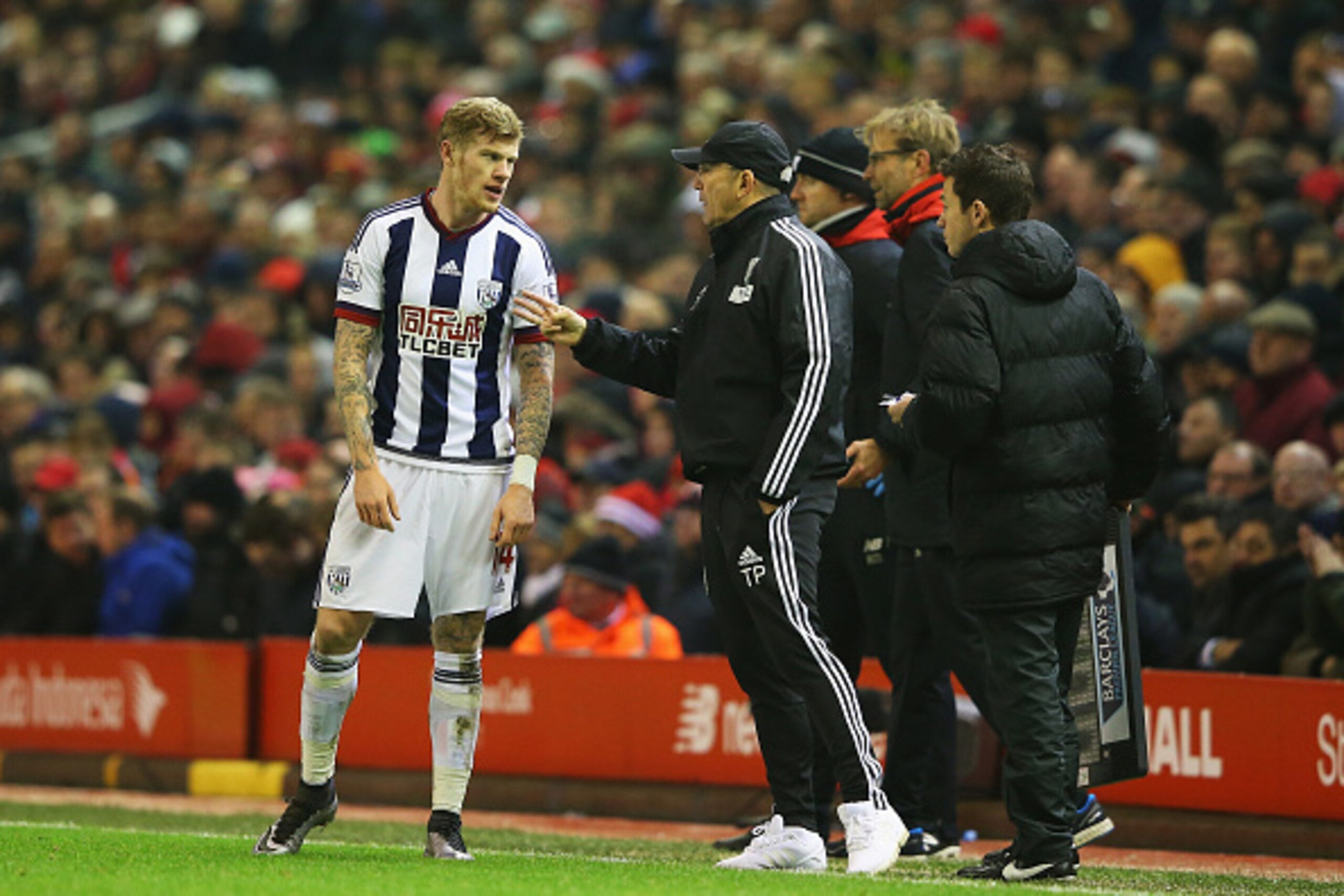 LIVERPOOL, ENGLAND - DECEMBER 13:  Tony Pulis, manager of West Bromwich Albion in discussion with James McClean of West Bromwich Albion during the Barclays Premier League match between Liverpool and West Bromwich Albion at Anfield on December 13, 2015 in 