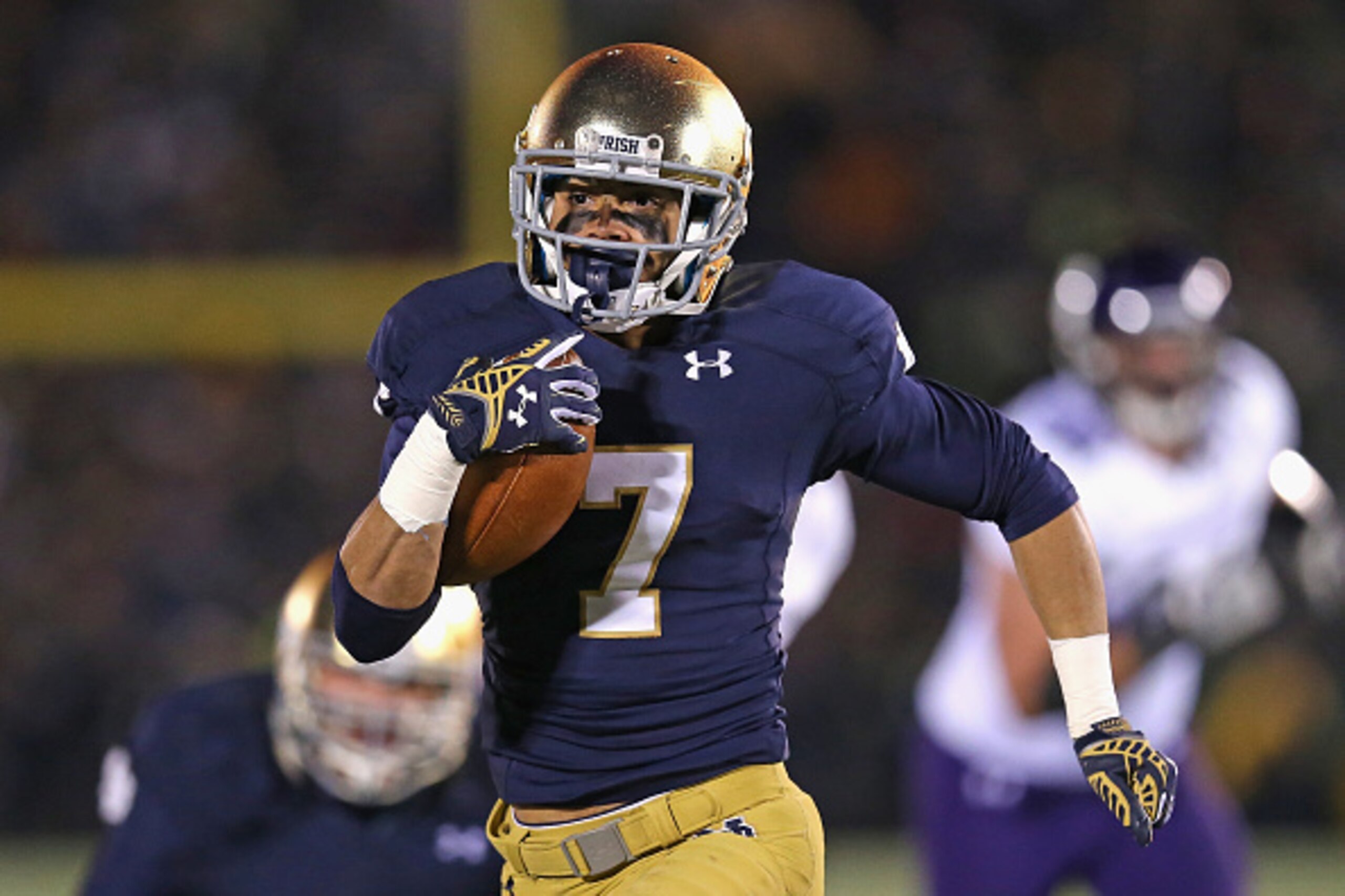 SOUTH BEND, IN - NOVEMBER 15: Will Fuller #7 of the Notre Dame Fighting Irish runs for a touchdown against the Northwestern Wildcats at Notre Dame Stadium on November 15, 2014 in South Bend, Indiana. Northwestern defeated Notre Dame 43-40 in overtime. (Ph