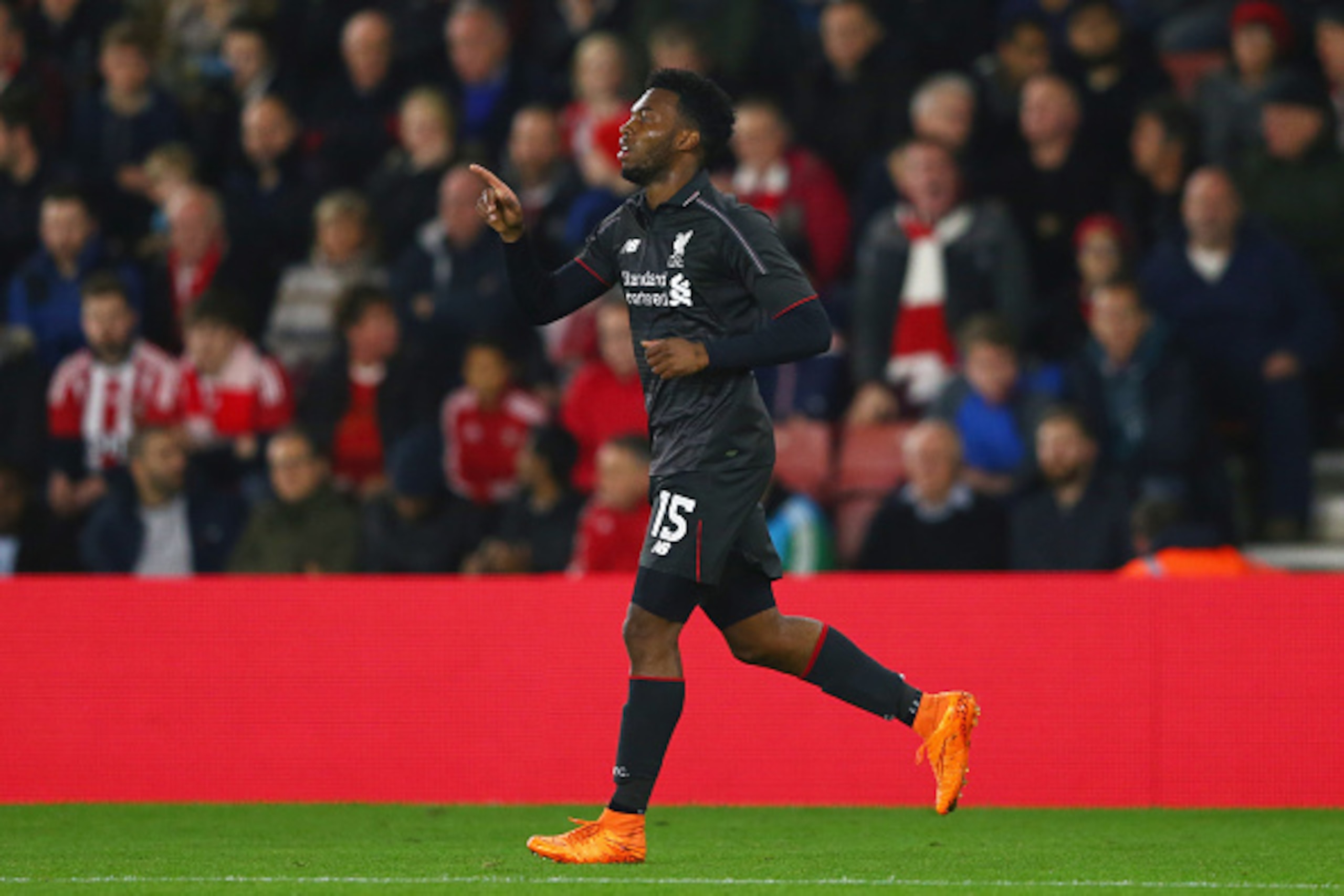 SOUTHAMPTON, ENGLAND - DECEMBER 02:  Daniel Sturridge of Liverpool celebrates as he scores their first goal during the Capital One Cup quarter final match between Southampton and Liverpool at St Mary's Stadium on December 2, 2015 in Southampton, England. 
