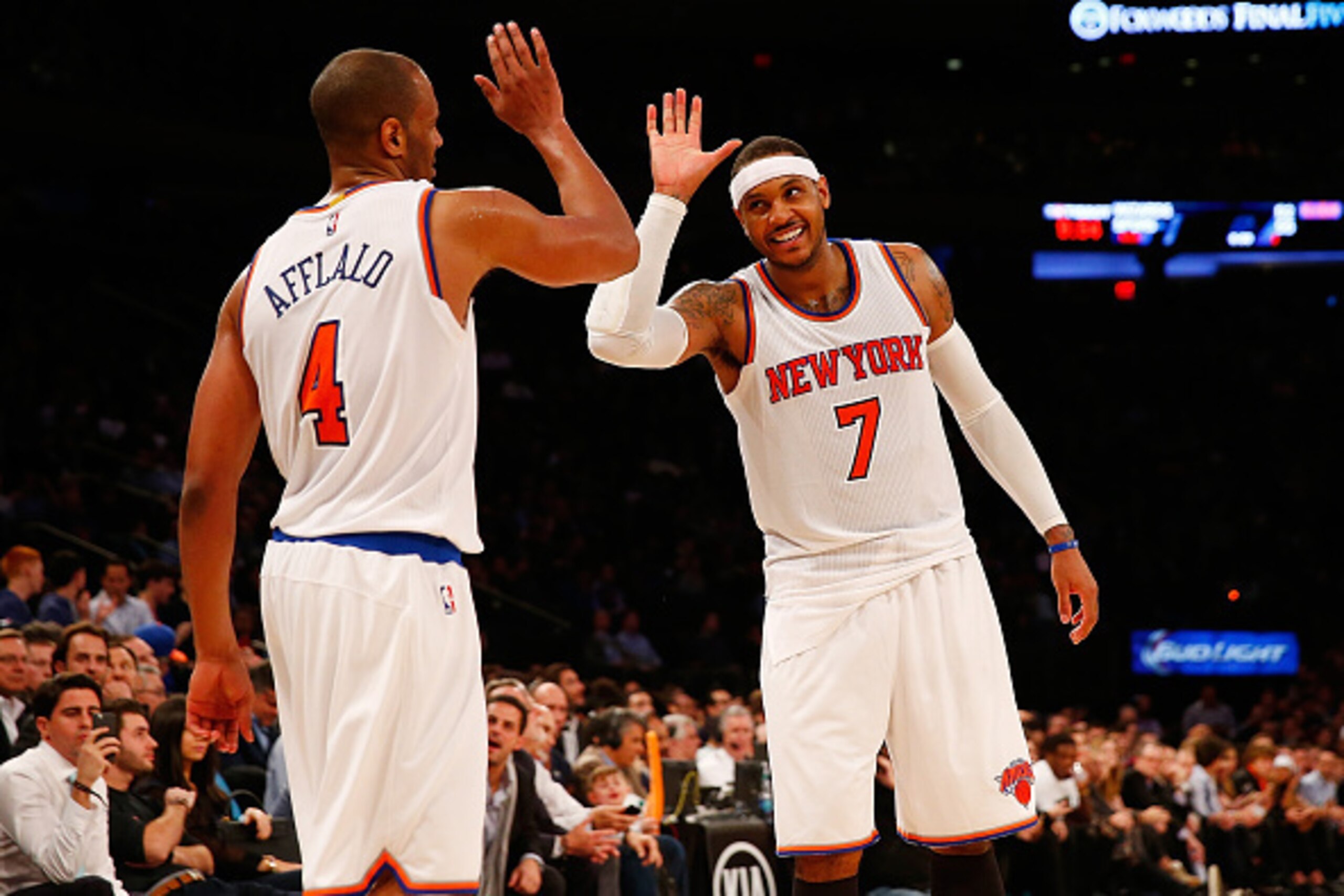 NEW YORK, NY - DECEMBER 16: Carmelo Anthony #7 of the New York Knicks and teammate Arron Afflalo #4 celebrate against the Minnesota Timberwolves  at Madison Square Garden on December 16, 2015 in New York City. NOTE TO USER: User expressly acknowledges and