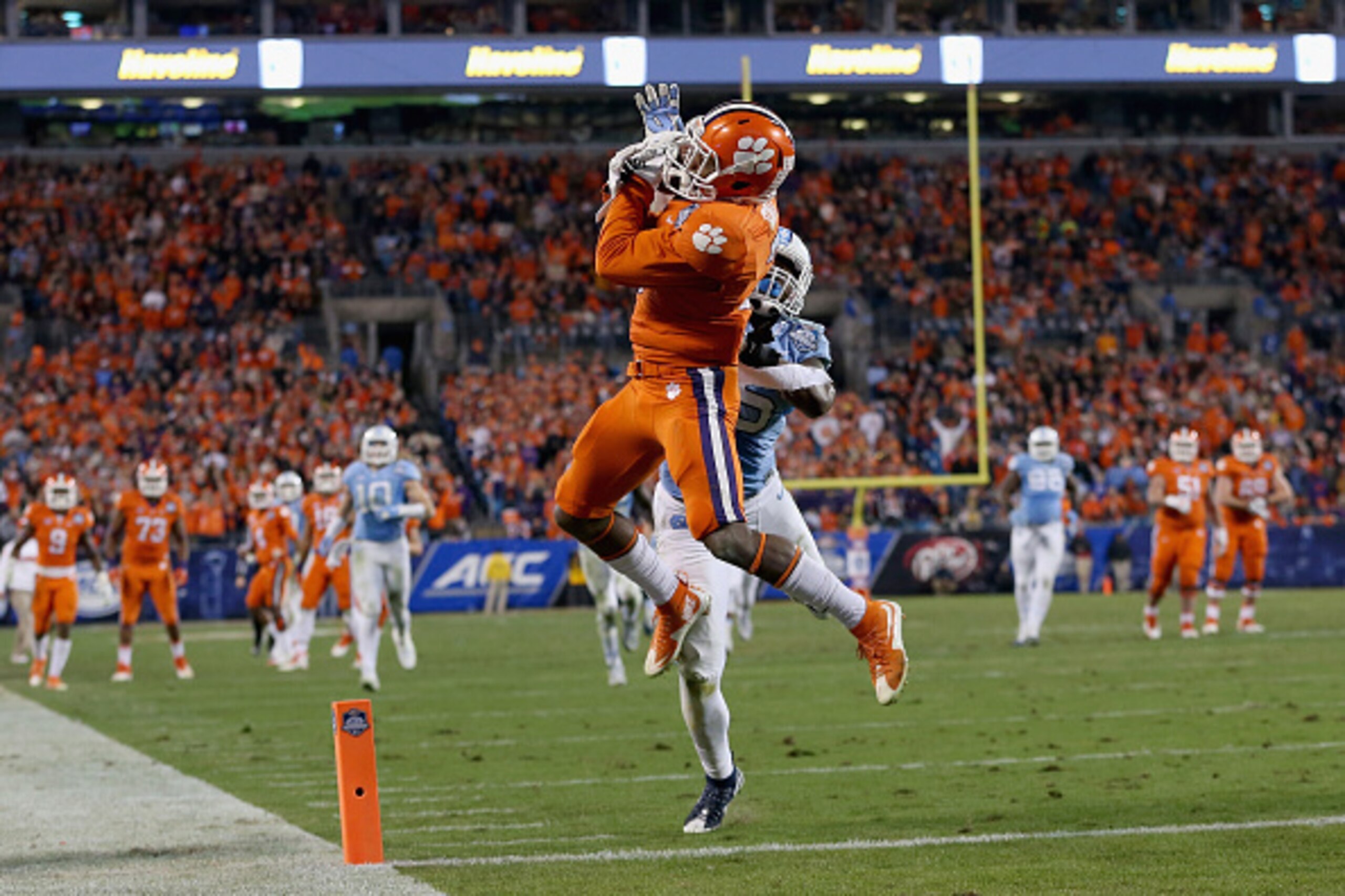 CHARLOTTE, NC - DECEMBER 05:  Artavis Scott #3 of the Clemson Tigers catches a touchdown against the North Carolina Tar Heels in the 3rd quarter during the Atlantic Coast Conference Football Championship at Bank of America Stadium on December 5, 2015 in C