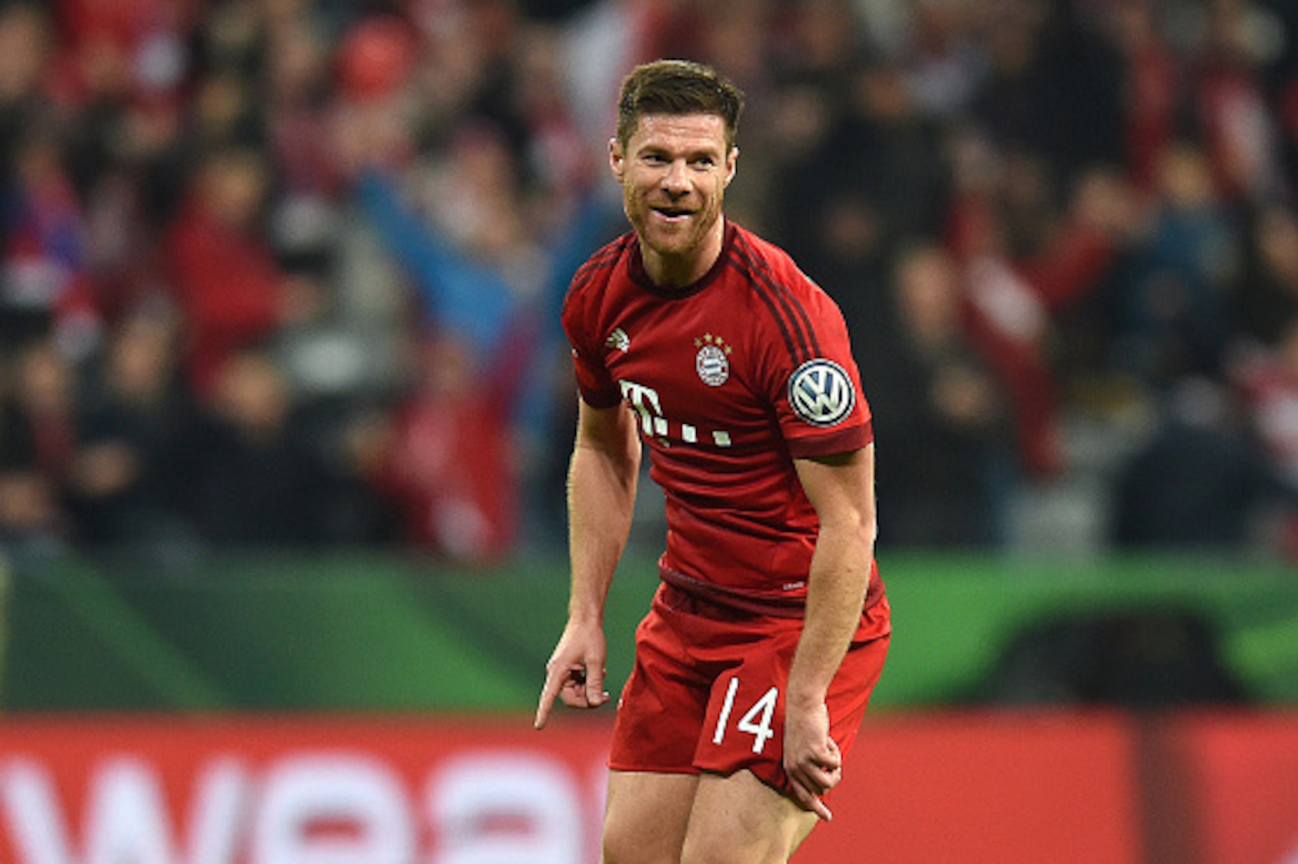 Spanish midfielder Xabi Alonso celebrates the first goal during the German Cup DFB Pokal third round match between FC Bayern Munich and SV Darmstadt 98 in Munich on December 15, 2015. / AFP / Christof STACHE / RESTRICTIONS: ACCORDING TO DFB RULES IMAGE S Spanish midfielder Xabi Alonso celebrates the first goal during the German Cup DFB Pokal third round match between FC Bayern Munich and SV Darmstadt 98 in Munich on December 15, 2015. / AFP / Christof STACHE / RESTRICTIONS: ACCORDING TO DFB RULES IMAGE S