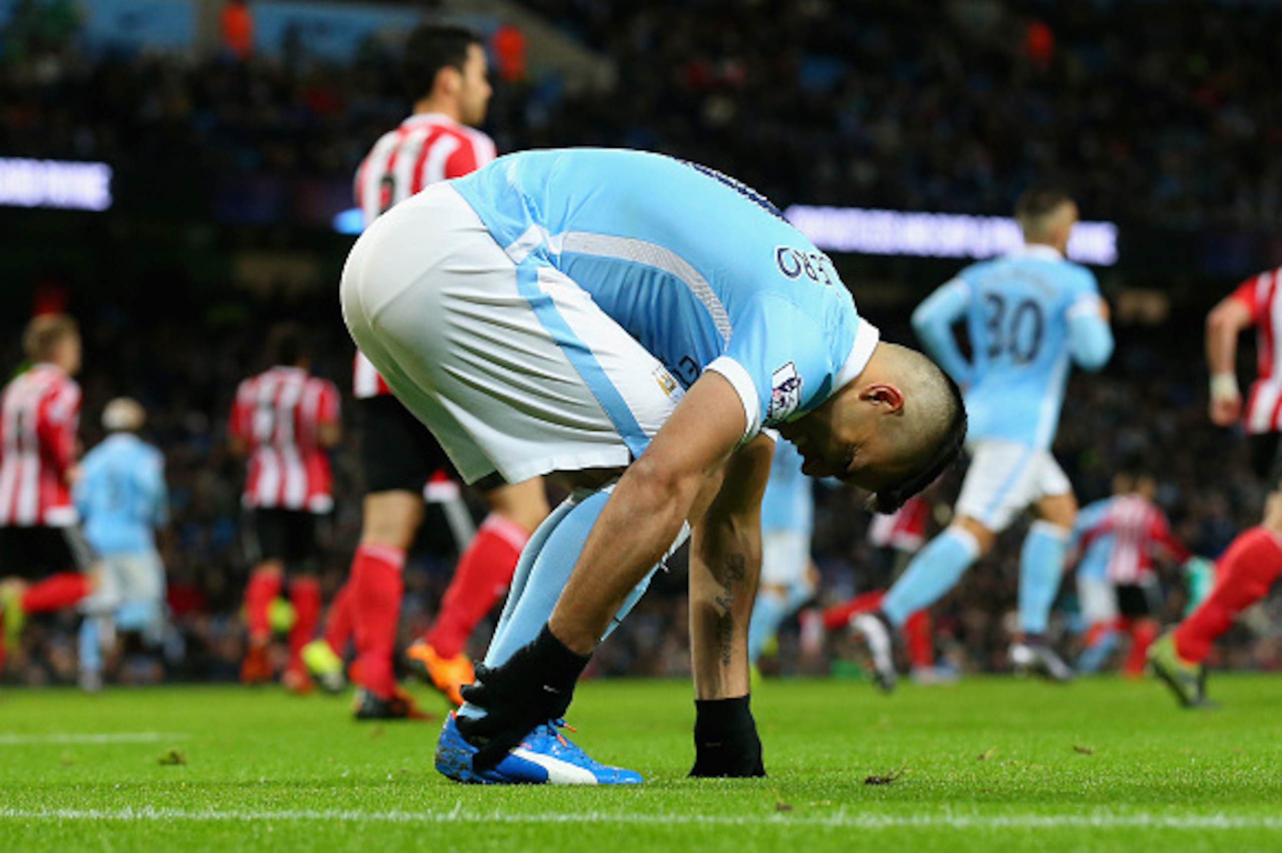 MANCHESTER, ENGLAND - NOVEMBER 28:  Sergio Aguero of Manchester City picks up an injury during the Barclays Premier League match between Manchester City and Southampton at the Etihad Stadium on November 28, 2015 in Manchester, England.  (Photo by Alex Liv
