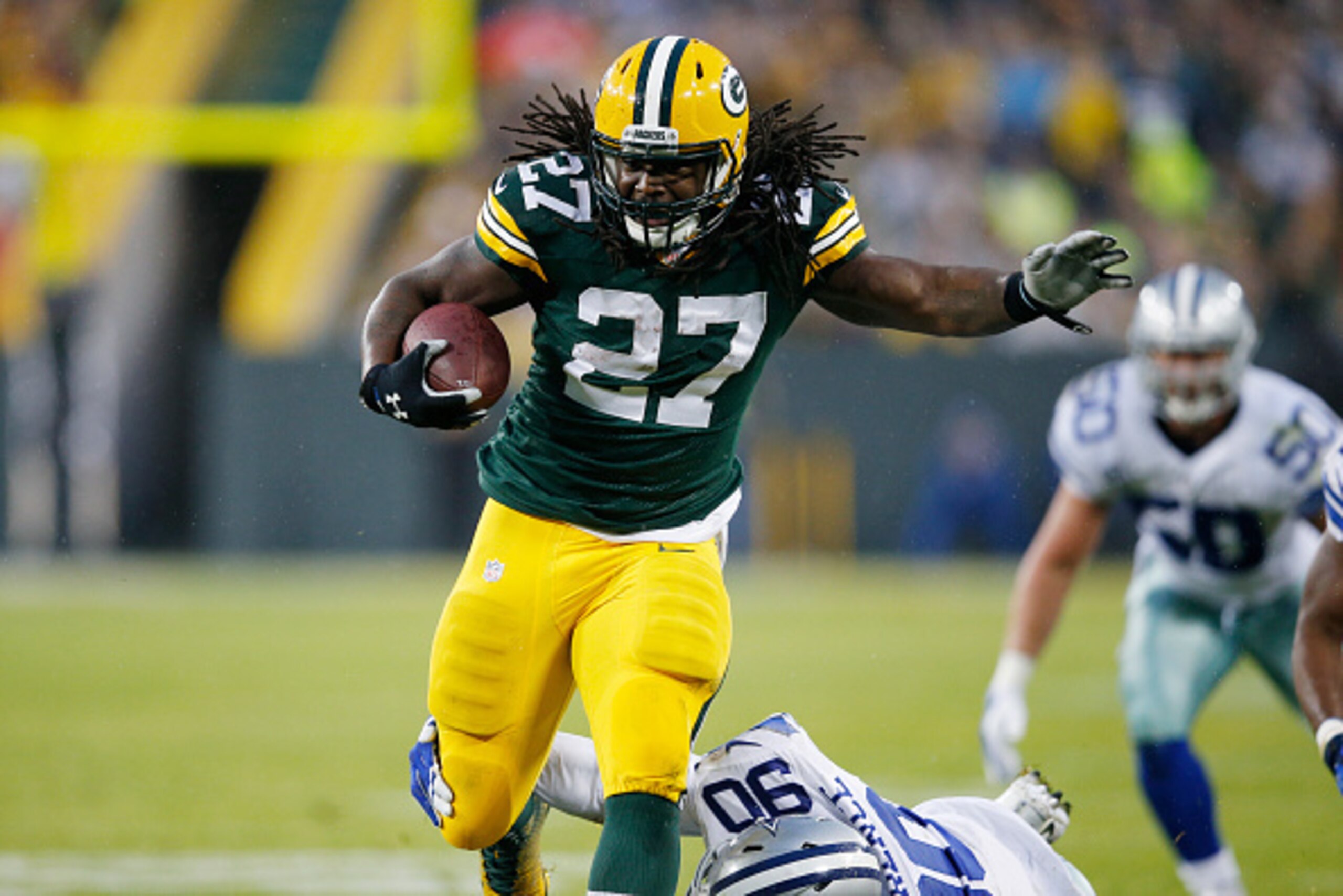 GREEN BAY, WI - DECEMBER 13: Eddie Lacy #27 of the Green Bay Packers runs the ball against the Dallas Cowboys during the game at Lambeau Field on December 13, 2015 in Green Bay, Wisconsin. The Packers defeated the Cowboys 28-7. (Photo by Joe Robbins/Getty GREEN BAY, WI - DECEMBER 13: Eddie Lacy #27 of the Green Bay Packers runs the ball against the Dallas Cowboys during the game at Lambeau Field on December 13, 2015 in Green Bay, Wisconsin. The Packers defeated the Cowboys 28-7. (Photo by Joe Robbins/Getty