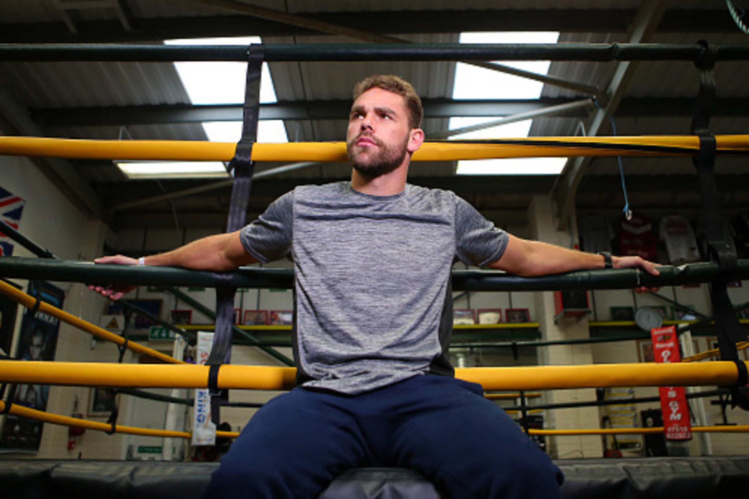 SALFORD, ENGLAND - DECEMBER 14: Boxer Billy Joe Saunders gives a television interview during a media work-out at Oliver's Gym on December 14, 2015 in Salford, England. Saunders faces champion Andy Lee for the World Middleweight Title this Saturday in Manc