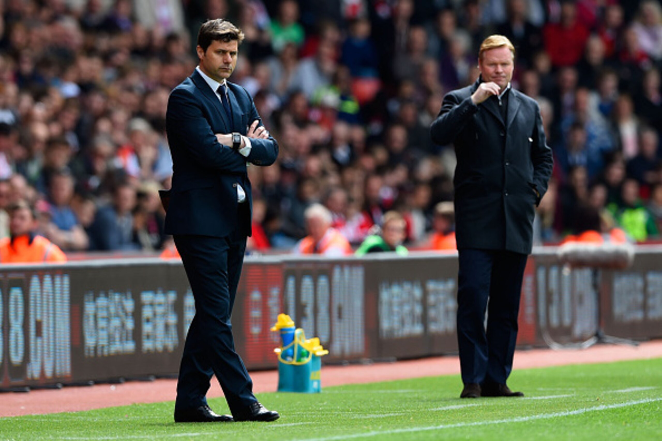 SOUTHAMPTON, ENGLAND - APRIL 25:  Manager Mauricio Pochettino of Spurs and Ronald Koeman manager of Southampton on the touchline during the Barclays Premier League match between Southampton and Tottenham Hotspur at St Mary's Stadium on April 25, 2015 in S