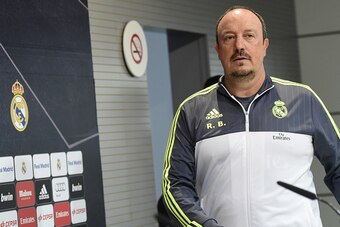 Real Madrid's coach Rafael Benitez arrives to take part in a press conference at Valdebebas sport city in Madrid on December 12, 2015.  AFP PHOTO / JAVIER SORIANO / AFP / JAVIER SORIANO        (Photo credit should read JAVIER SORIANO/AFP/Getty Images)