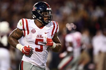 STARKVILLE, MS - NOVEMBER 28:  Robert Nkemdiche #5 of the Mississippi Rebels comes off the field during a game against the Mississippi State Bulldogs at Davis Wade Stadium on November 28, 2015 in Starkville, Mississippi.  Mississippi defeated Mississippi 