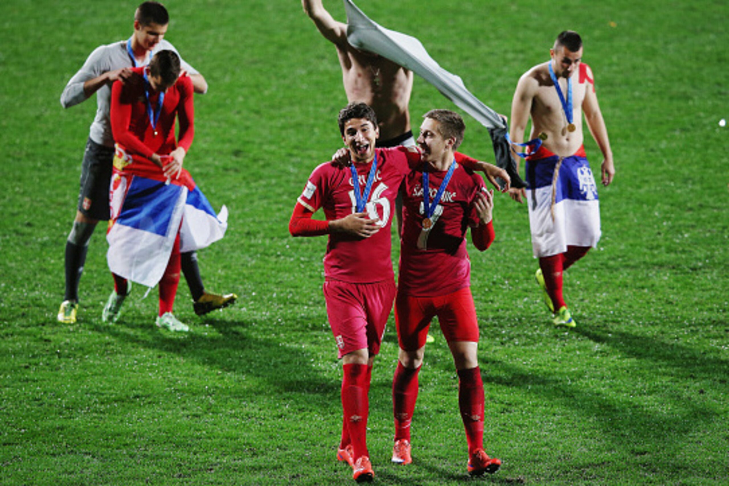 AUCKLAND, NEW ZEALAND - JUNE 20:  Marko Grujic of Serbia and Ivan Saponjic of Serbia celebrate after winning the FIFA U-20 World Cup Final match between Brazil and Serbia at North Harbour Stadium on June 20, 2015 in Auckland, New Zealand.  (Photo by Hanna