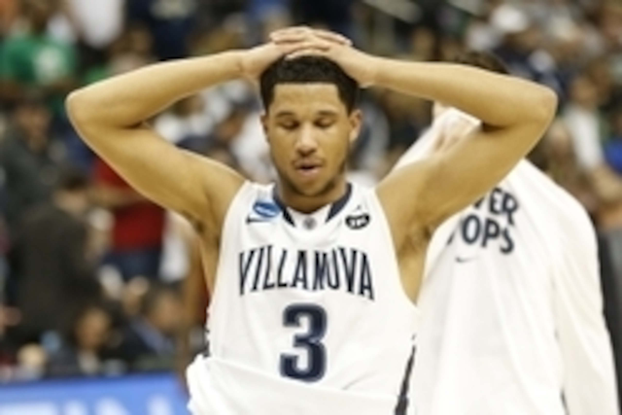 Mar 21, 2015; Pittsburgh, PA, USA; Villanova Wildcats guard Josh Hart (3) reacts after the game against the North Carolina State Wolfpack in the third round of the 2015 NCAA Tournamentat Consol Energy Center. The Wolfpack won 71-68. Mandatory Credit: Geof