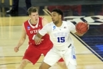 Mar 27, 2015; Houston, TX, USA; Duke Blue Devils center Jahlil Okafor (15) posts up against Utah Utes forward Jakob Poeltl (42) during the first half in the semifinals of the south regional of the 2015 NCAA Tournament at Reliant Stadium. Mandatory Credit: