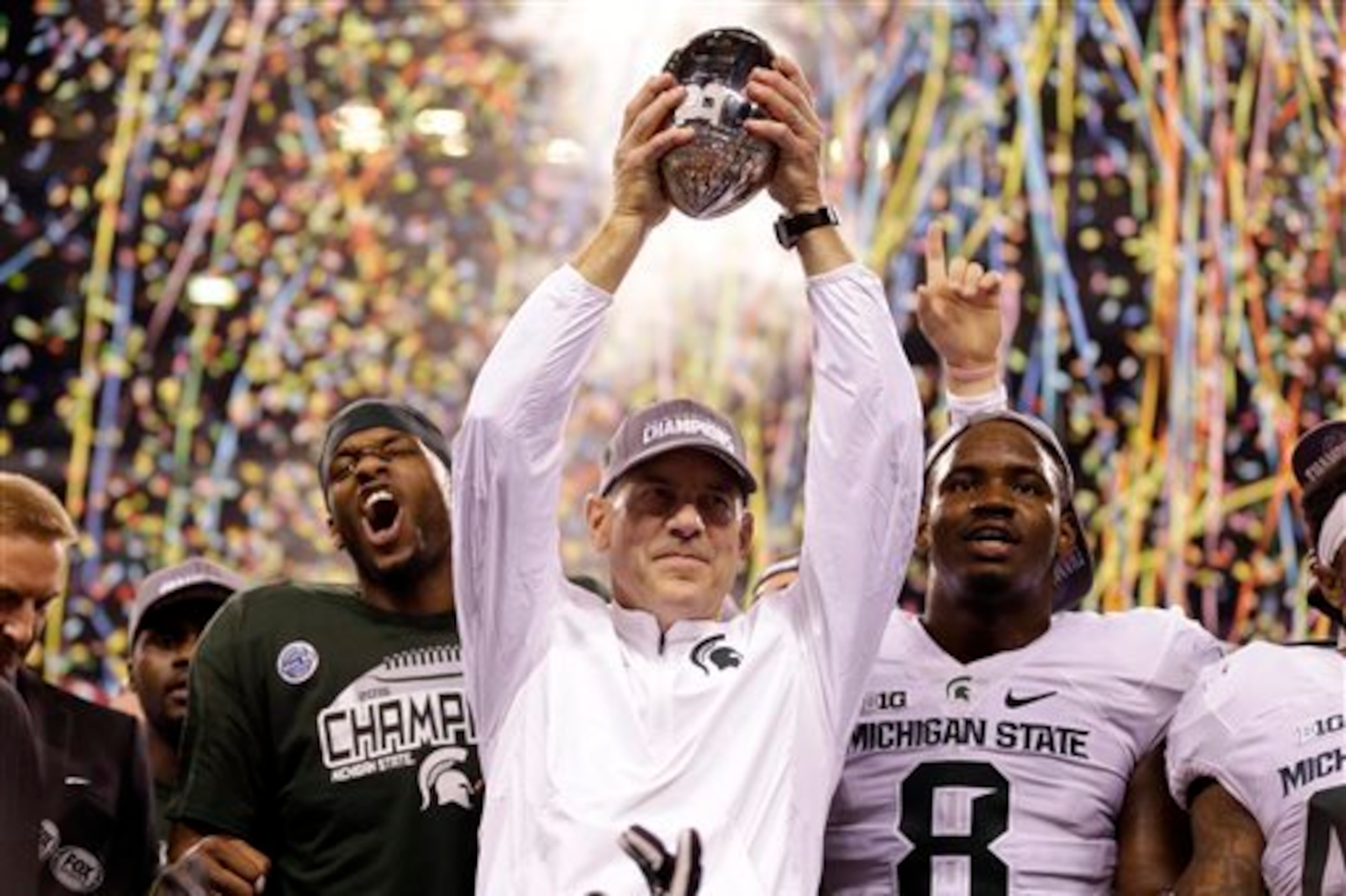 Michigan State HC Mark Dantonio (center)