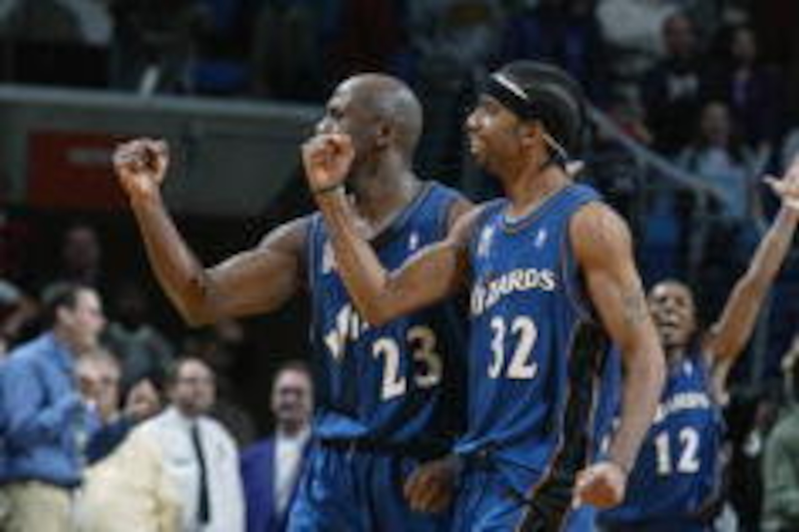 CLEVELAND - JANUARY 31:  Guard Michael Jordan #23 of the Washington Wizards and guard Richard Hamilton #32 celebrate after Jordan hit the game-winning shot at the end of the NBA game against the Cleveland Cavaliers at Gund Arena in Cleveland, Ohio on Janu