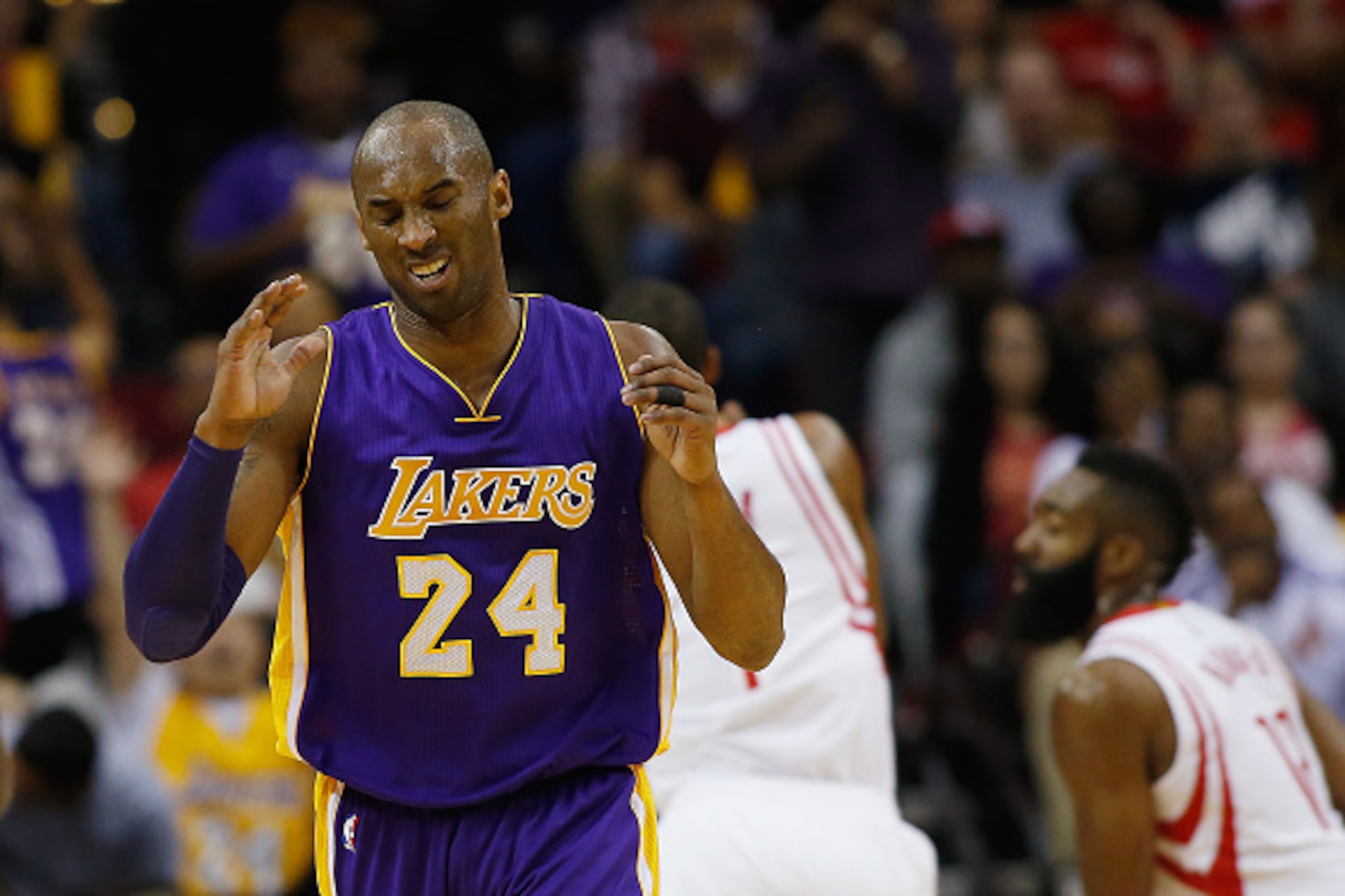 HOUSTON, TX - DECEMBER 12:  Kobe Bryant #24 of the Los Angeles Lakers reacts to a play during the game against the Houston Rockets at the Toyota Center on December 12, 2015 in Houston, Texas. NOTE TO USER: User expressly acknowledges and agrees that, by d