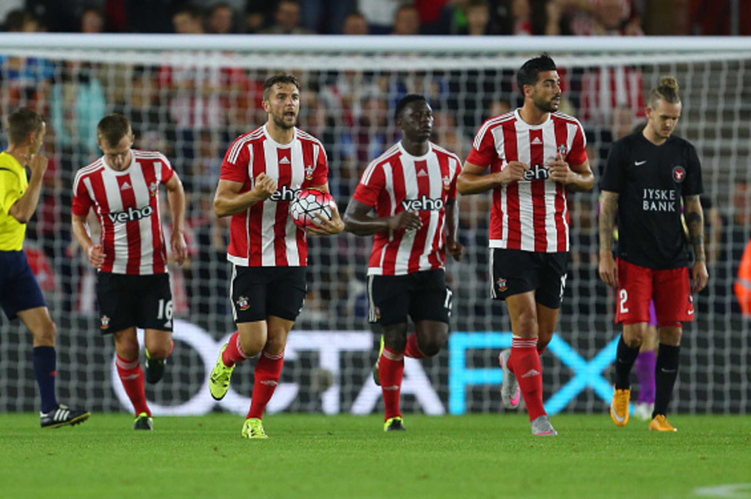 SOUTHAMPTON, ENGLAND - AUGUST 20:  Jay Rodriguez of Southampton celebrates as he runs back up the pitch after scoring a penalty to make it 1-1 during the UEFA Europa League Play Off Round 1st Leg match between Southampton and FC Midtjylland at St Mary's S