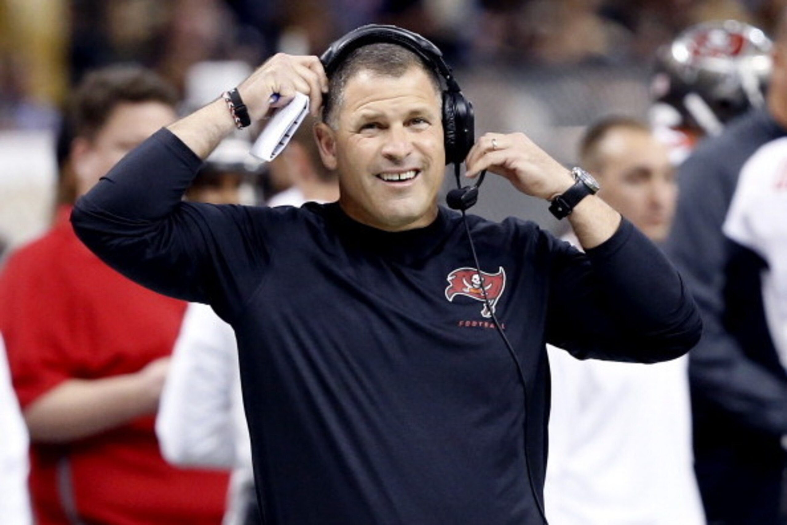 NEW ORLEANS, LA - DECEMBER 29:  Head coach Greg Schiano of the Tampa Bay Buccaneers watches the action from the sideline in the first half of play against the Saints at the Mercedes-Benz Superdome on December 29, 2013 in New Olreans, Louisiana. The Saints