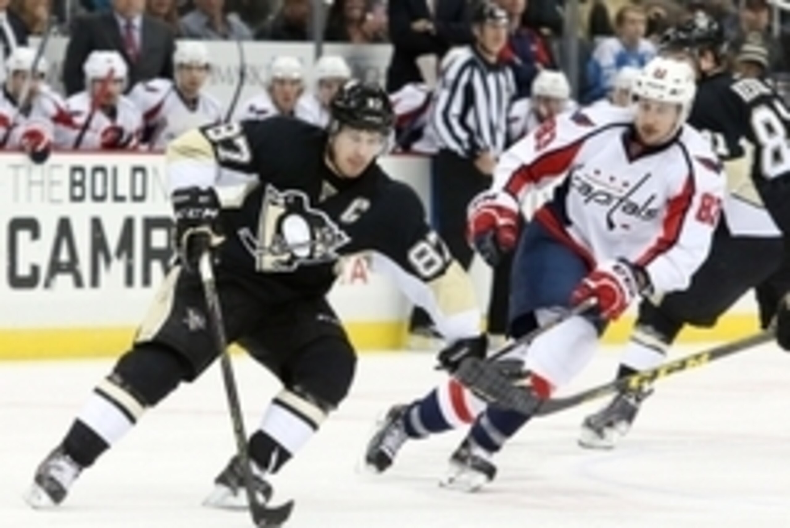 Dec 14, 2015; Pittsburgh, PA, USA; Pittsburgh Penguins center Sidney Crosby (87) handles the puck against Washington Capitals center Jay Beagle (83) during the third period at the CONSOL Energy Center. The Capitals won 4-1. Mandatory Credit: Charles LeCla