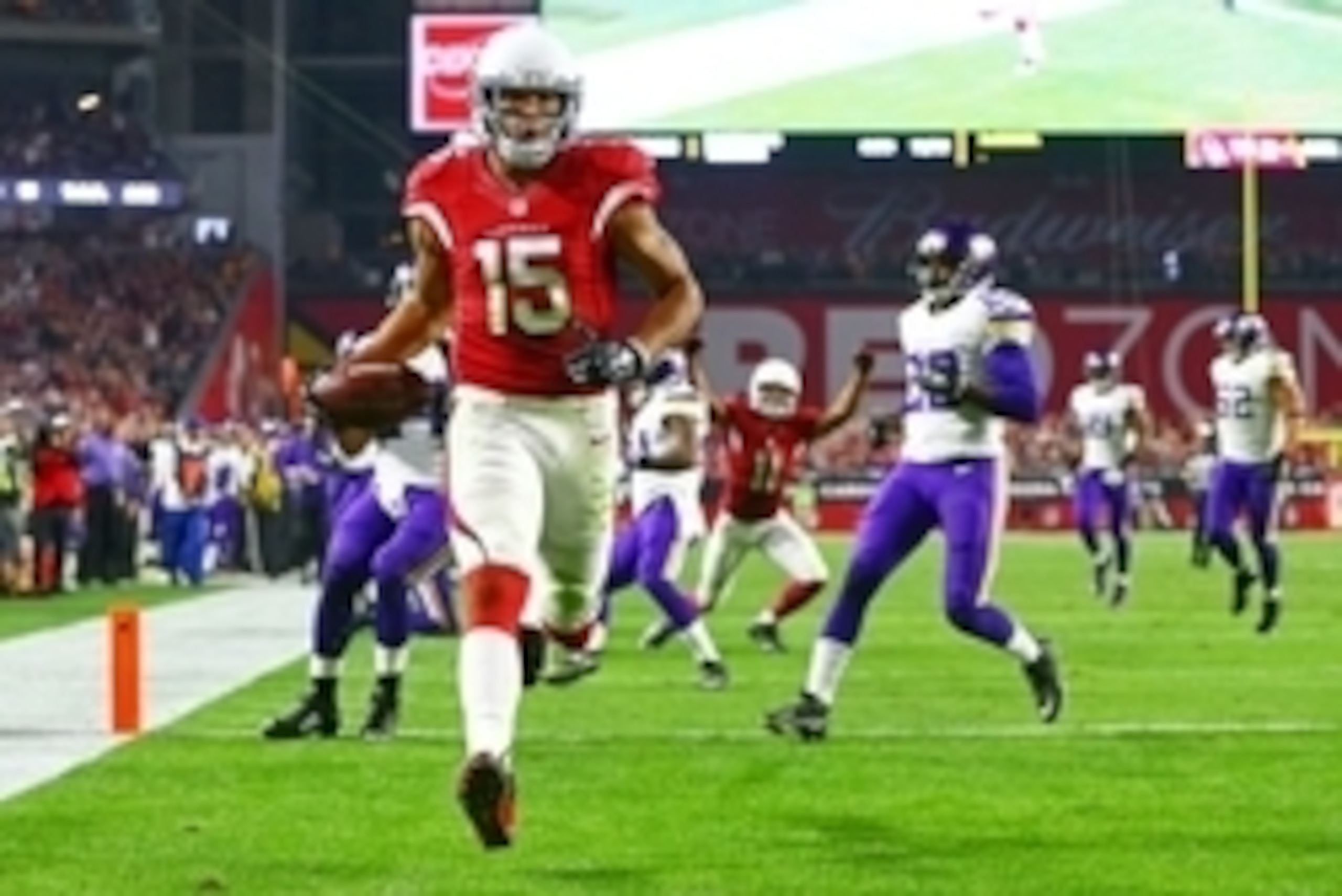 Dec 10, 2015; Glendale, AZ, USA; Arizona Cardinals wide receiver Michael Floyd (15) scores a touchdown in the second half against the Minnesota Vikings at University of Phoenix Stadium. The Cardinals defeated the Vikings 23-20. Mandatory Credit: Mark J. R
