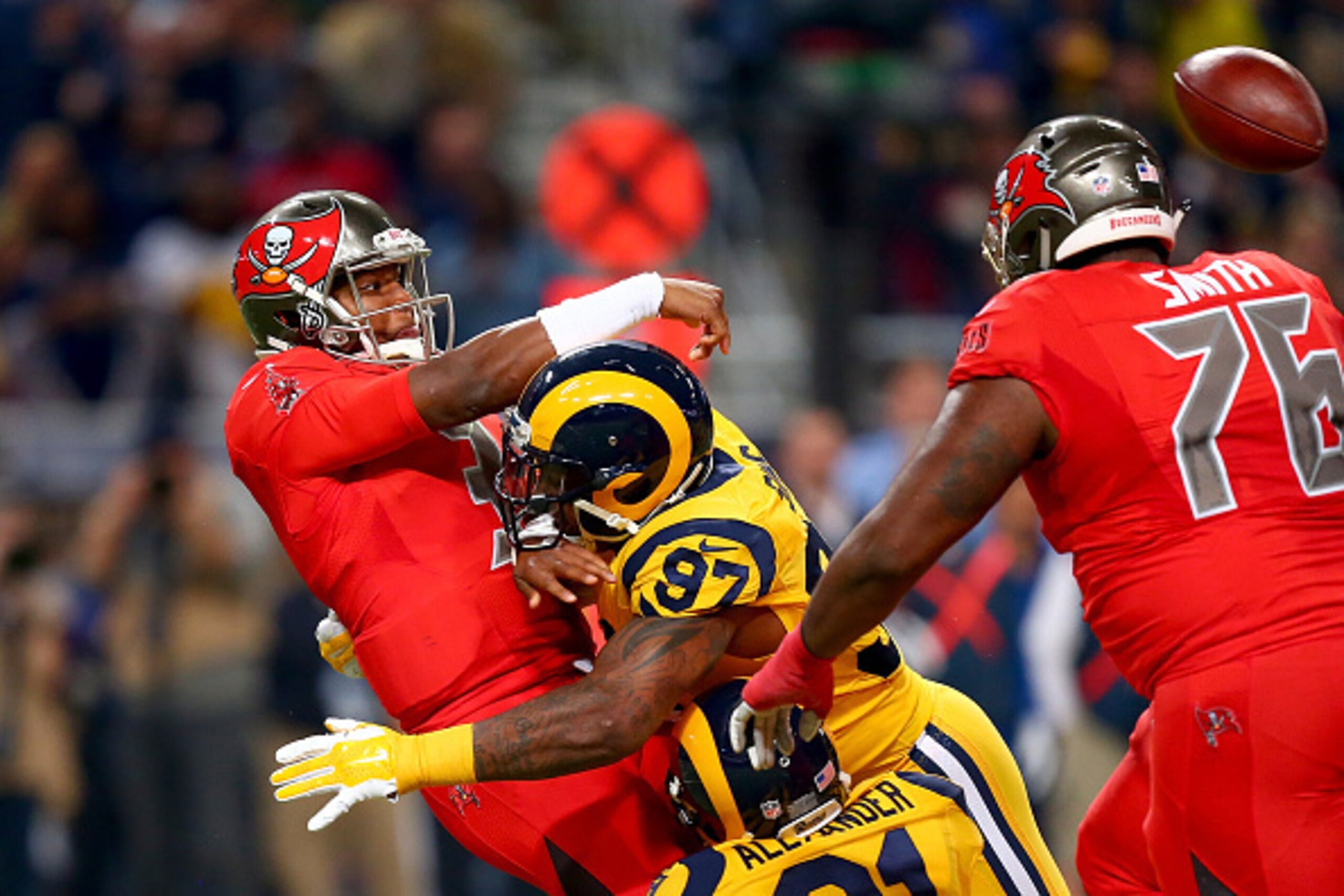 ST. LOUIS, MO - DECEMBER 17: Jameis Winston #3 of the Tampa Bay Buccaneers is sacked by Eugene Sims #97 of the St. Louis Rams in the first quarter at the Edward Jones Dome on December 17, 2015 in St. Louis, Missouri. (Photo by Dilip Vishwanat/Getty Images