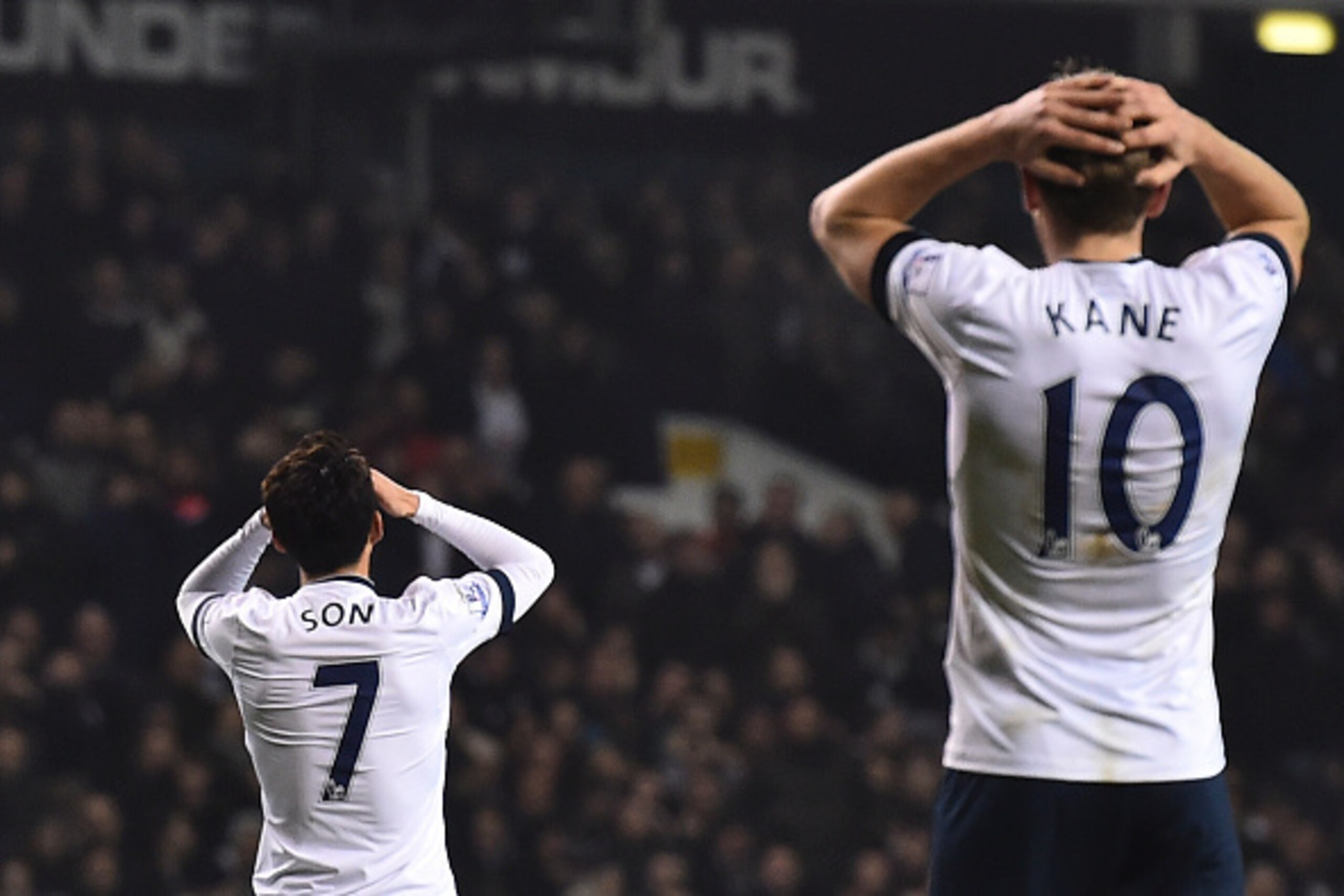 Tottenham Hotspur's South Korean striker Son Heung-Min (L) and Tottenham Hotspur's English striker Harry Kane (R) react after Son missed a chance during the English Premier League football match between Tottenham Hotspur and Newcastle United at White Hart
