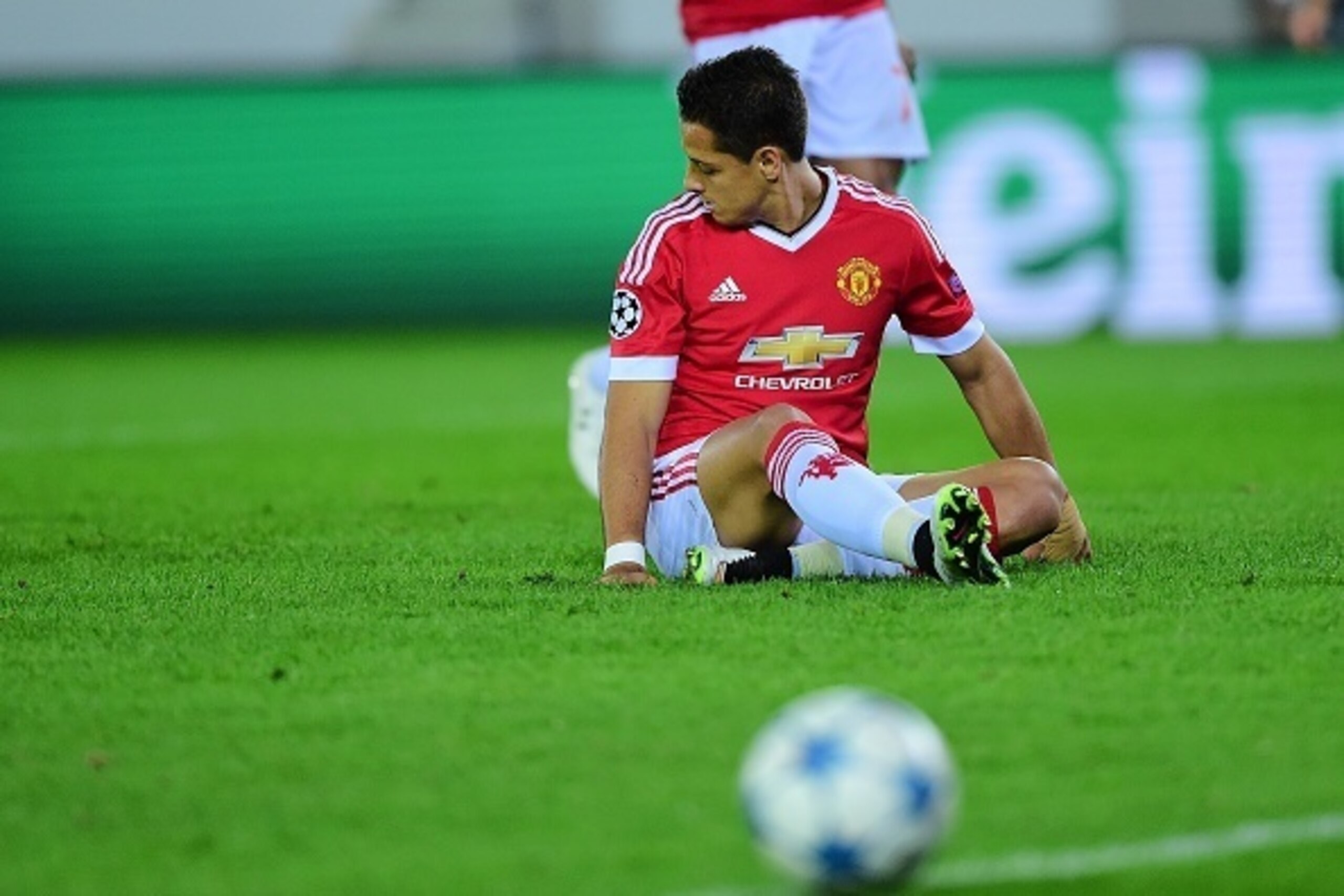 Manchester United's Javier Hernandez reacts after falling while shooting a penalty and missing it during the UEFA Champions League playoff football match between Club Brugge and Manchester United at Jan Breydel Stadium in Bruges, August 26, 2015. AFP PHOT