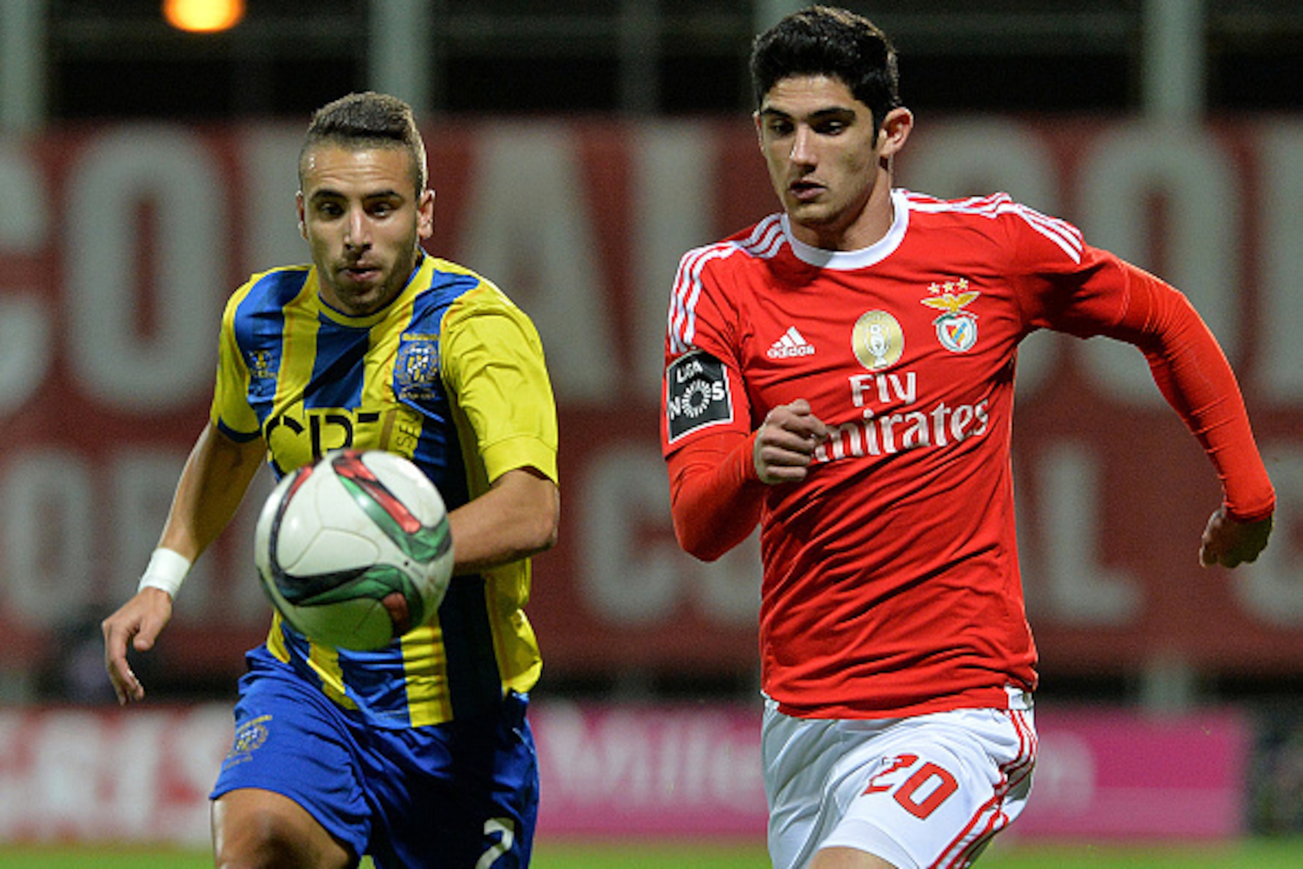 Uniao Madeira's defender Paulinho (L) vies with Benfica's forward Goncalo Guedes during the Portuguese league football match Uniao da Madeira vs SL Benfica at the Da Madeira stadium in Funchal on December 15, 2015. AFP PHOTO/ RUI SILVA / AFP / RUI SILVA Uniao Madeira's defender Paulinho (L) vies with Benfica's forward Goncalo Guedes during the Portuguese league football match Uniao da Madeira vs SL Benfica at the Da Madeira stadium in Funchal on December 15, 2015. AFP PHOTO/ RUI SILVA / AFP / RUI SILVA