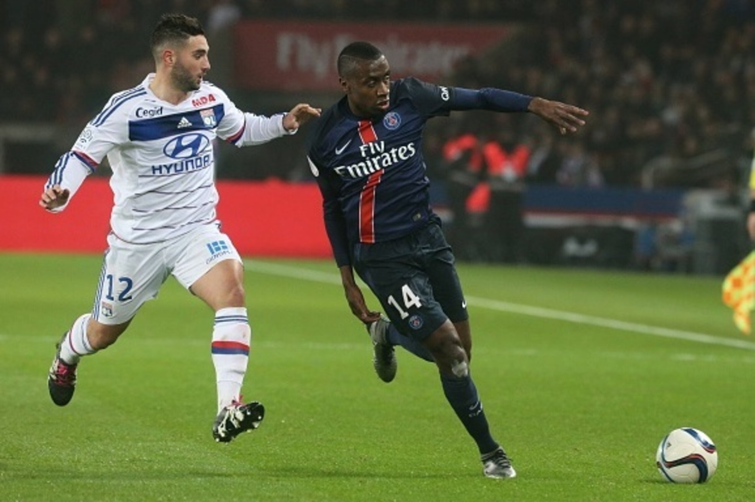 PARIS, FRANCE - DECEMBER 13: Jordan Ferri of Olypique Lyonnais and Blaise Matuidi of Paris Saint-Germain during the French  Ligue 1 between Paris Saint-Germain and Olympique Lyonnais at Parc Des Princes on December 13, 2015 in Paris, France.  (Photo by Xa