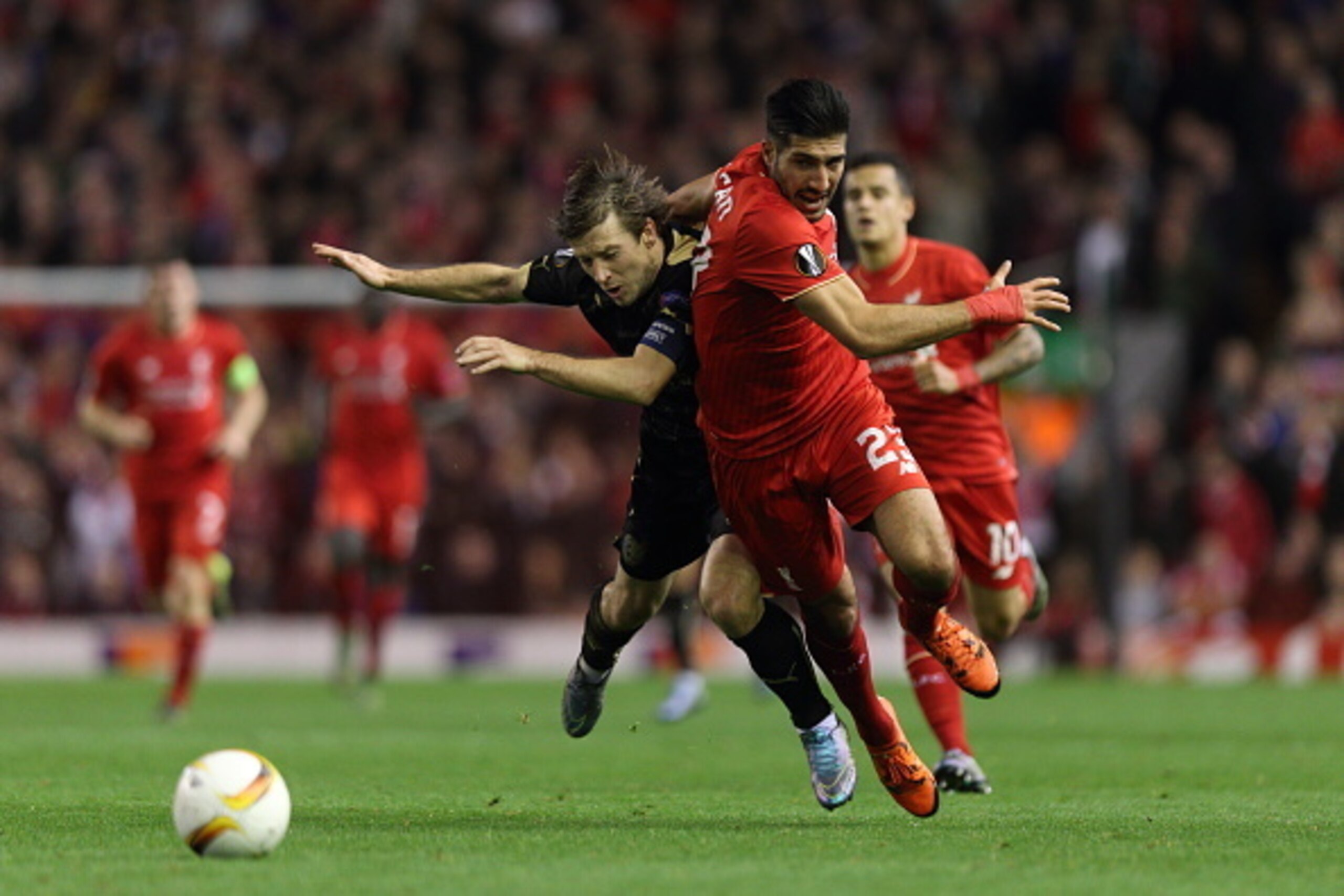 LIVERPOOL, ENGLAND - OCTOBER 22:  Oleg Kuzmin of Rubin Kazan collides with Emre Can of Liverpool which resulted in him receiving a red card during the UEFA Europa League match between Liverpool and Rubin Kazan at Anfield on October 22, 2015 in Liverpool, 