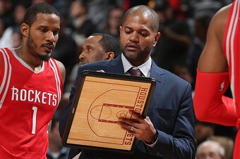 DENVER, CO - DECEMBER 14:  Head coach J.B. Bickerstaff of the Houston Rockets leads his team against the Denver Nuggetsd at Pepsi Center on December 14, 2015 in Denver, Colorado. The Nuggets defeated the Rockets 114-108. NOTE TO USER: User expressly ackno
