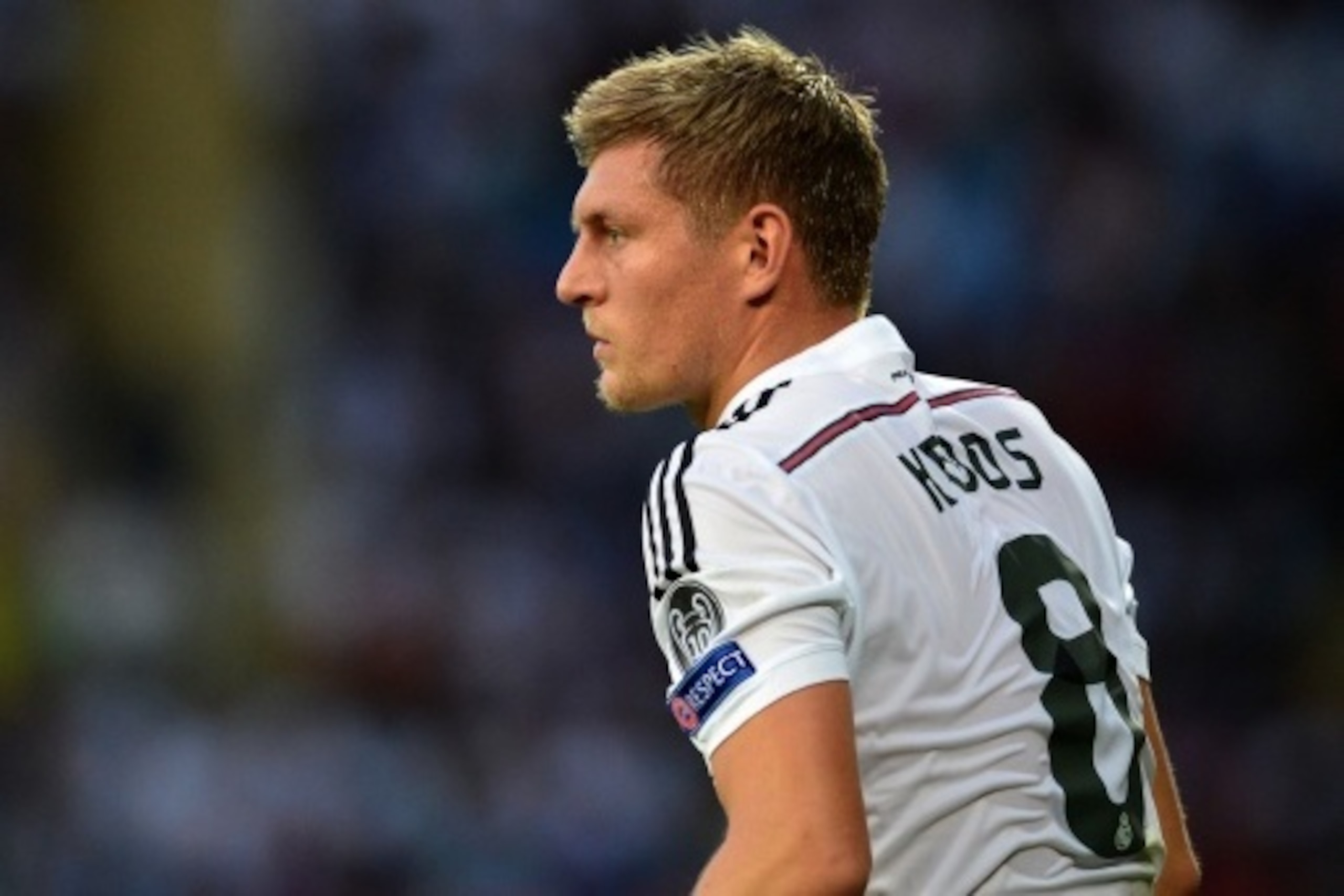 Real Madrids German midfielder Toni Kroos looks on during the UEFA Super Cup football match between Real Madrid and Sevilla at Cardiff City Stadium in Cardiff, south Wales on August 12, 2014. Cristiano Ronaldo upstaged new team-mates Toni Kroos and James 