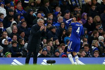 LONDON, ENGLAND - NOVEMBER 21:  Jose Mourinho (L) Manager of Chelsea instructs to Sesc Fabregas (R) during the Barclays Premier League match between Chelsea and Norwich City at Stamford Bridge on November 21, 2015 in London, England.  (Photo by Paul Gilha