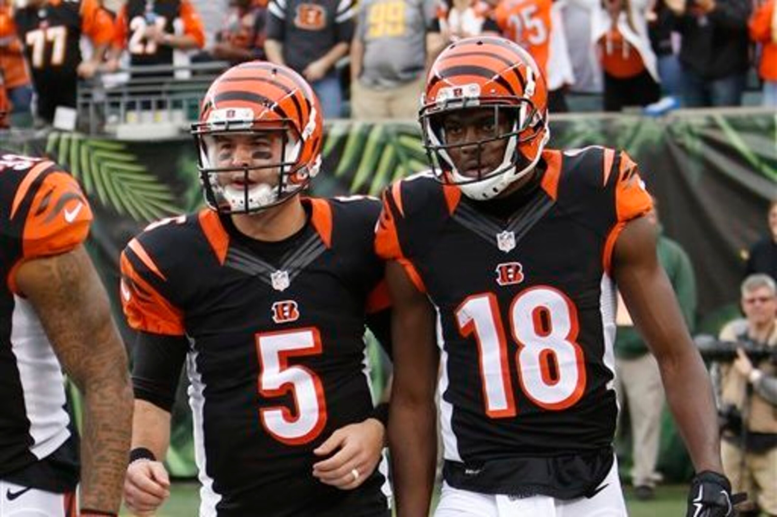 Quarterback A.J. McCarron (left) and wide receiver A.J. Green (right) will look to connect against a 49ers defense Sunday.