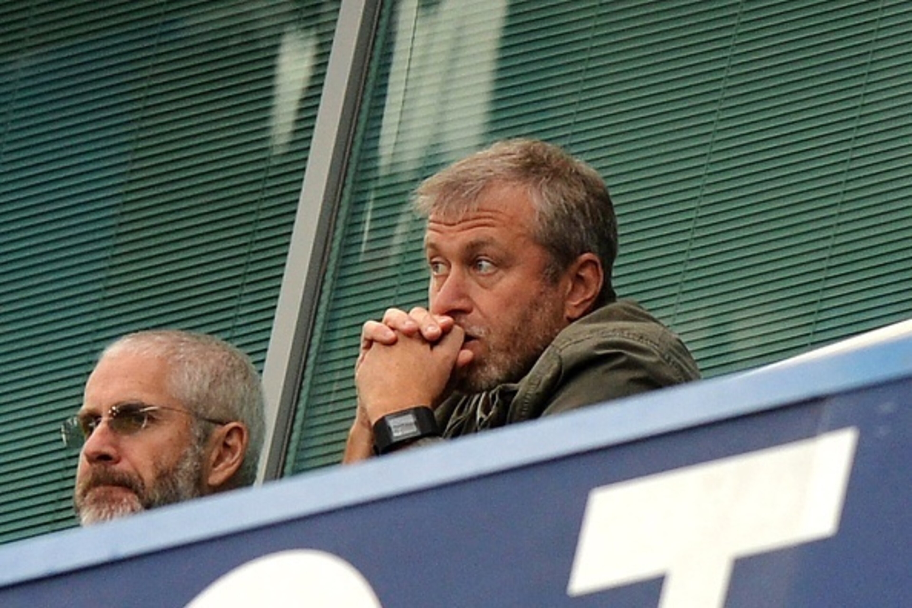 Chelsea's Russian owner Roman Abramovich watches the action during the English Premier League football match between Chelsea and Aston Villa at Stamford Bridge in London, on October 17, 2015. AFP PHOTO / OLLY GREENWOOD

RESTRICTED TO EDITORIAL USE. No use