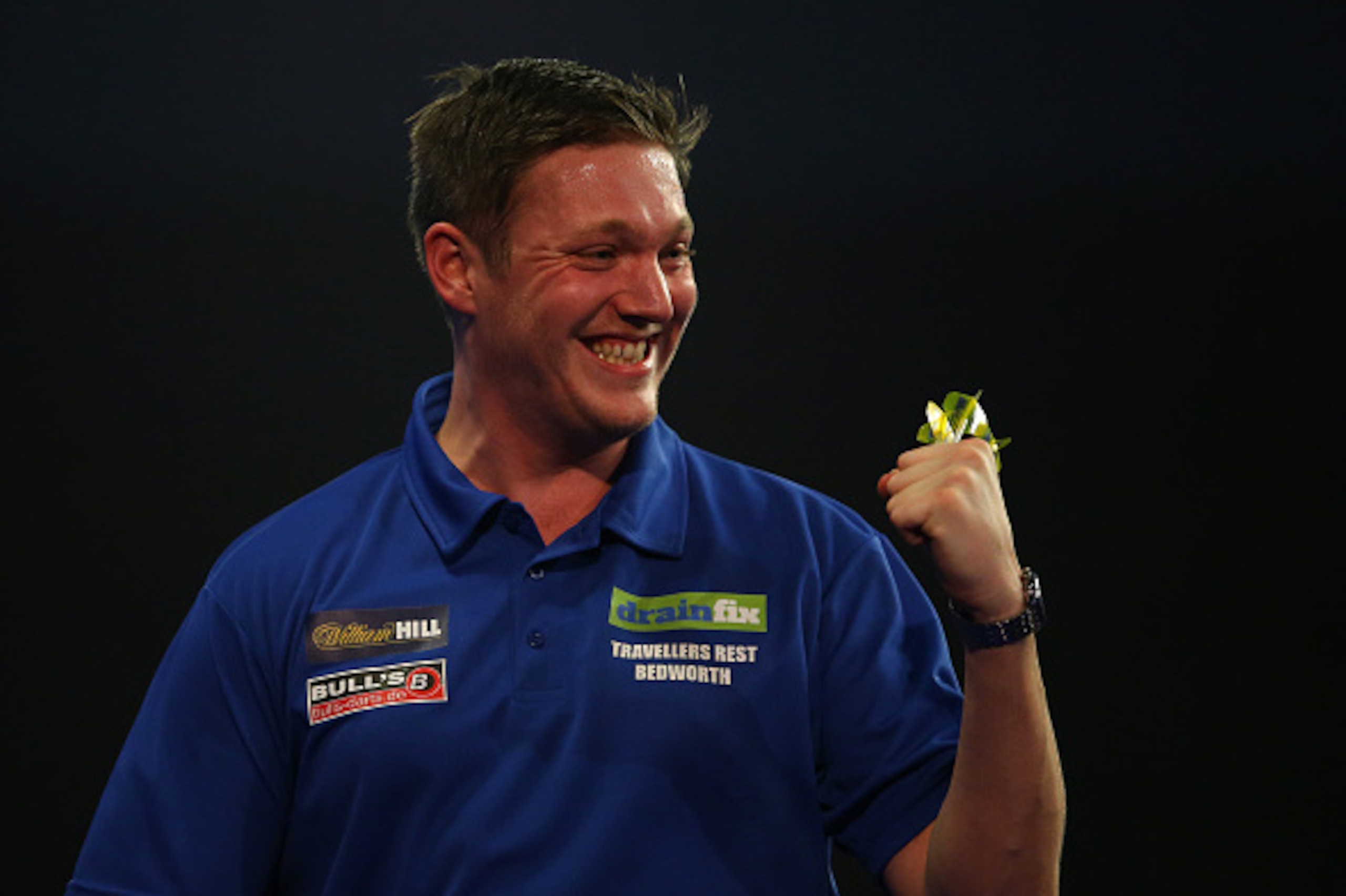 LONDON, ENGLAND - DECEMBER 18:  David Pallett reacts to winning his first round match against Kim Huybrechts on day two of the 2016 William Hill PDC World Darts Championships at Alexandra Palace on December 18, 2015 in London, England.  (Photo by Richard 