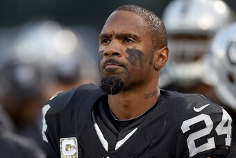 OAKLAND, CA - NOVEMBER 15:  Charles Woodson #24 of the Oakland Raiders looks on from the sidelines against the Minnesota Vikings during the fourth quarter of their NFL football game at O.co Coliseum on November 15, 2015 in Oakland, California.  (Photo by