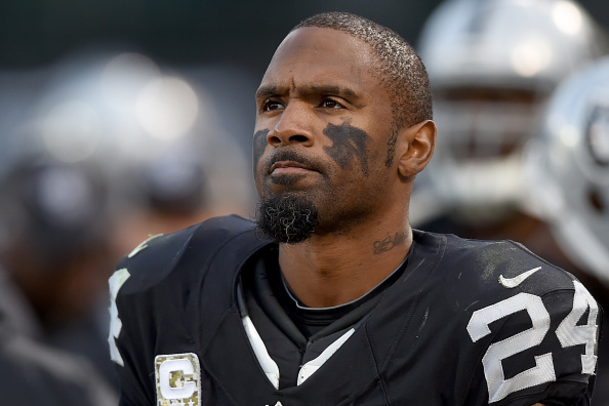 OAKLAND, CA - NOVEMBER 15:  Charles Woodson #24 of the Oakland Raiders looks on from the sidelines against the Minnesota Vikings during the fourth quarter of their NFL football game at O.co Coliseum on November 15, 2015 in Oakland, California.  (Photo by