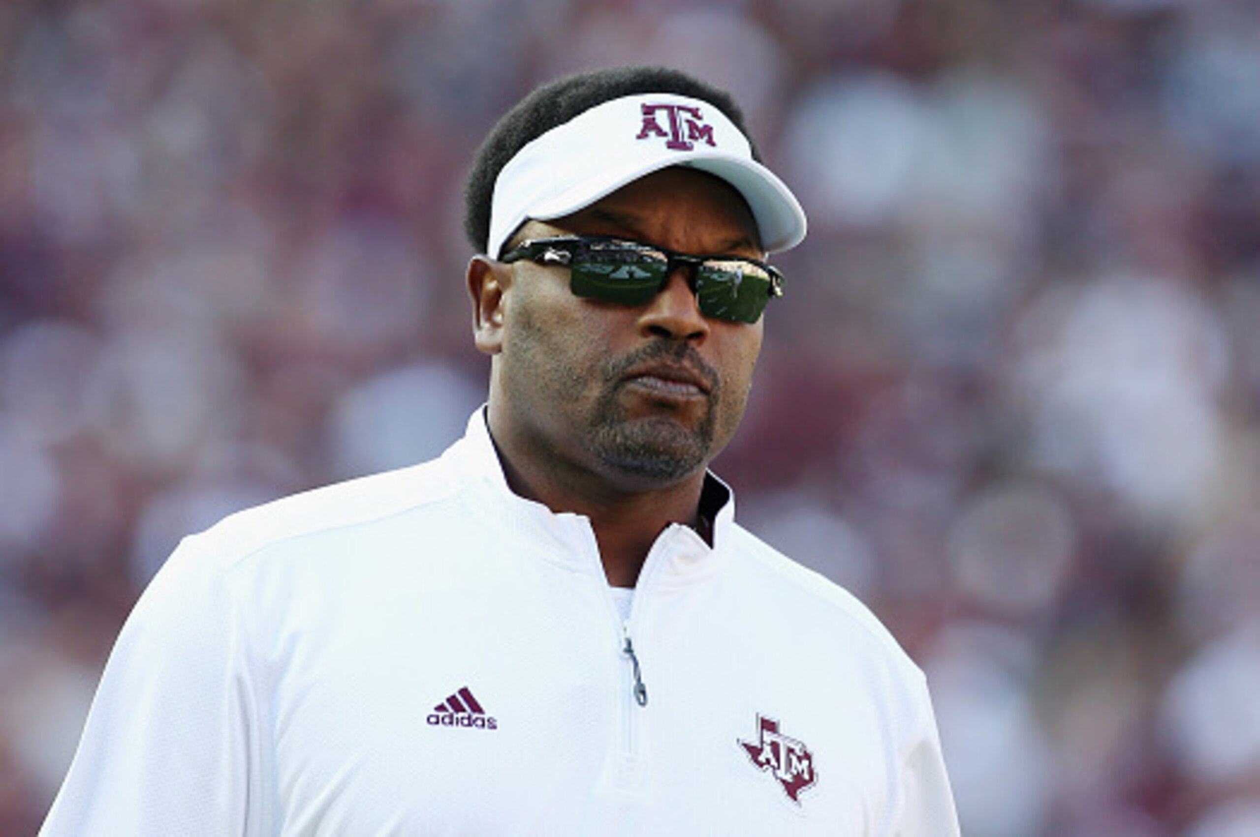 COLLEGE STATION, TX - SEPTEMBER 12:  Head coach Kevin Sumlin of the Texas A&M Aggies walks across the field before the start of their game against the Ball State Cardinals at Kyle Field on September 12, 2015 in College Station, Texas.  (Photo by Scott Hal