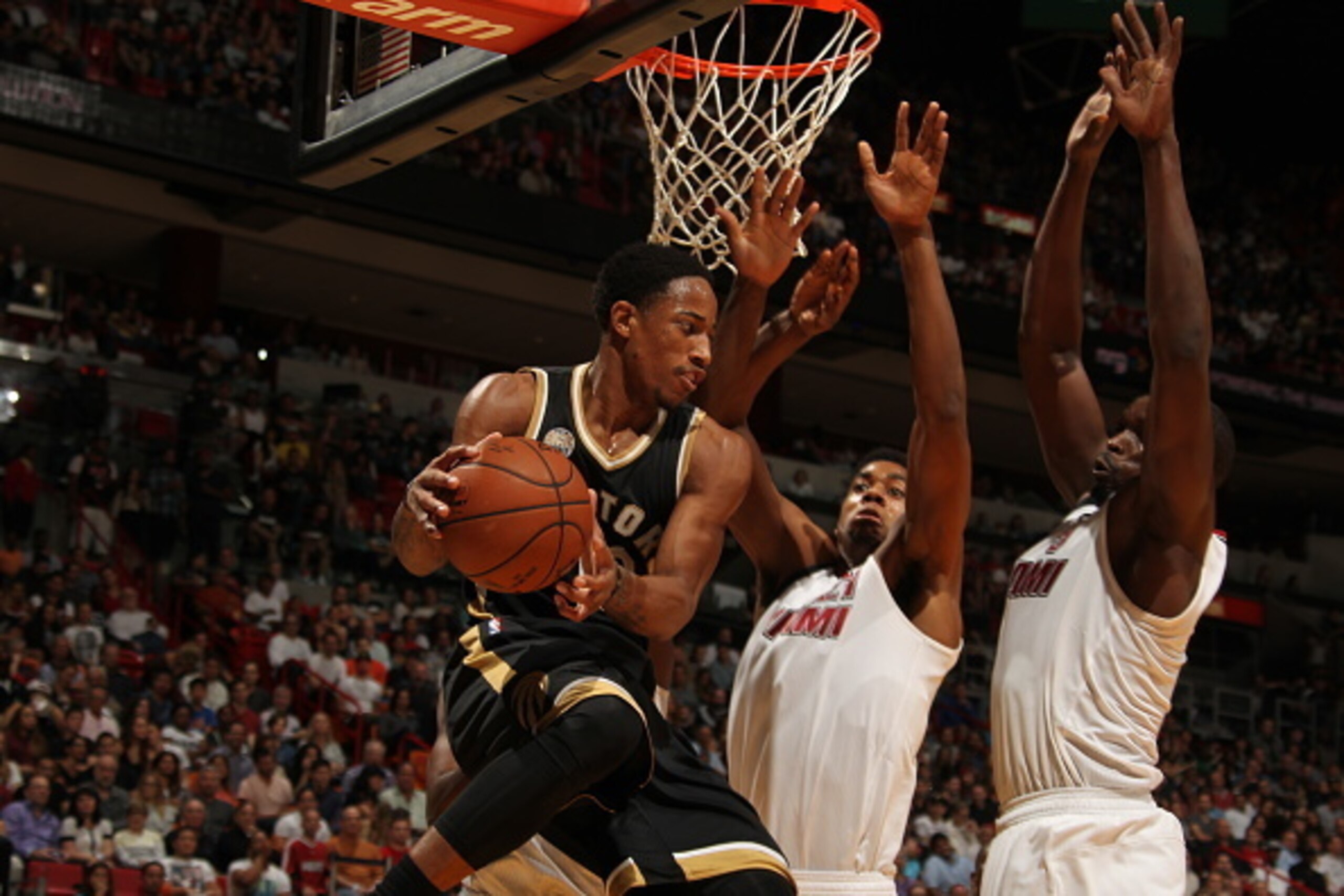 MIAMI, FL - DECEMBER 18:  DeMar DeRozan #10 of the Toronto Raptors goes to the basket against the Miami Heat on December 18, 2015 at AmericanAirlines Arena in Miami, Florida. NOTE TO USER: User expressly acknowledges and agrees that, by downloading and or