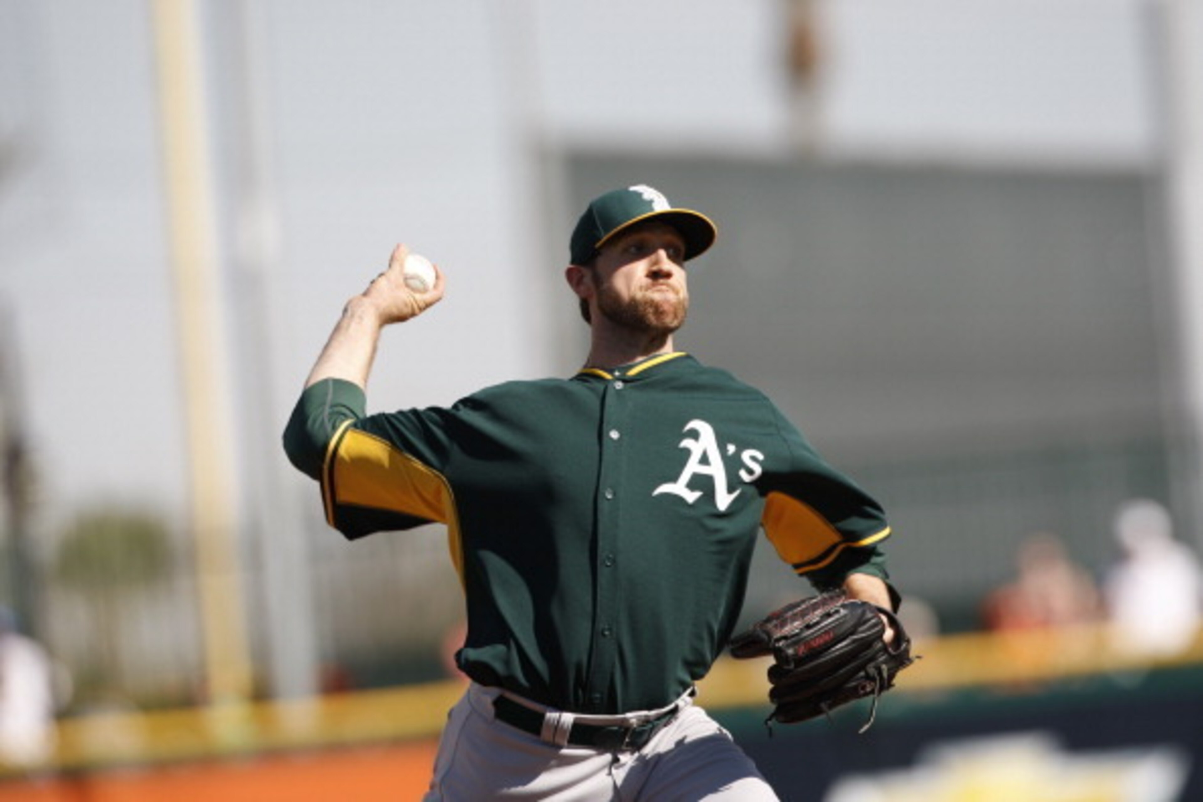 SCOTTSDALE, AZ - FEBRUARY 26: Josh Lindblom #25 of the Oakland Athletics pitches during a spring training game against the San Francisco Giants at Scottsdale Stadium on February 26, 2014 in Phoenix, Arizona. (Photo by Michael Zagaris/Oakland Athletics/Ge SCOTTSDALE, AZ - FEBRUARY 26: Josh Lindblom #25 of the Oakland Athletics pitches during a spring training game against the San Francisco Giants at Scottsdale Stadium on February 26, 2014 in Phoenix, Arizona. (Photo by Michael Zagaris/Oakland Athletics/Ge