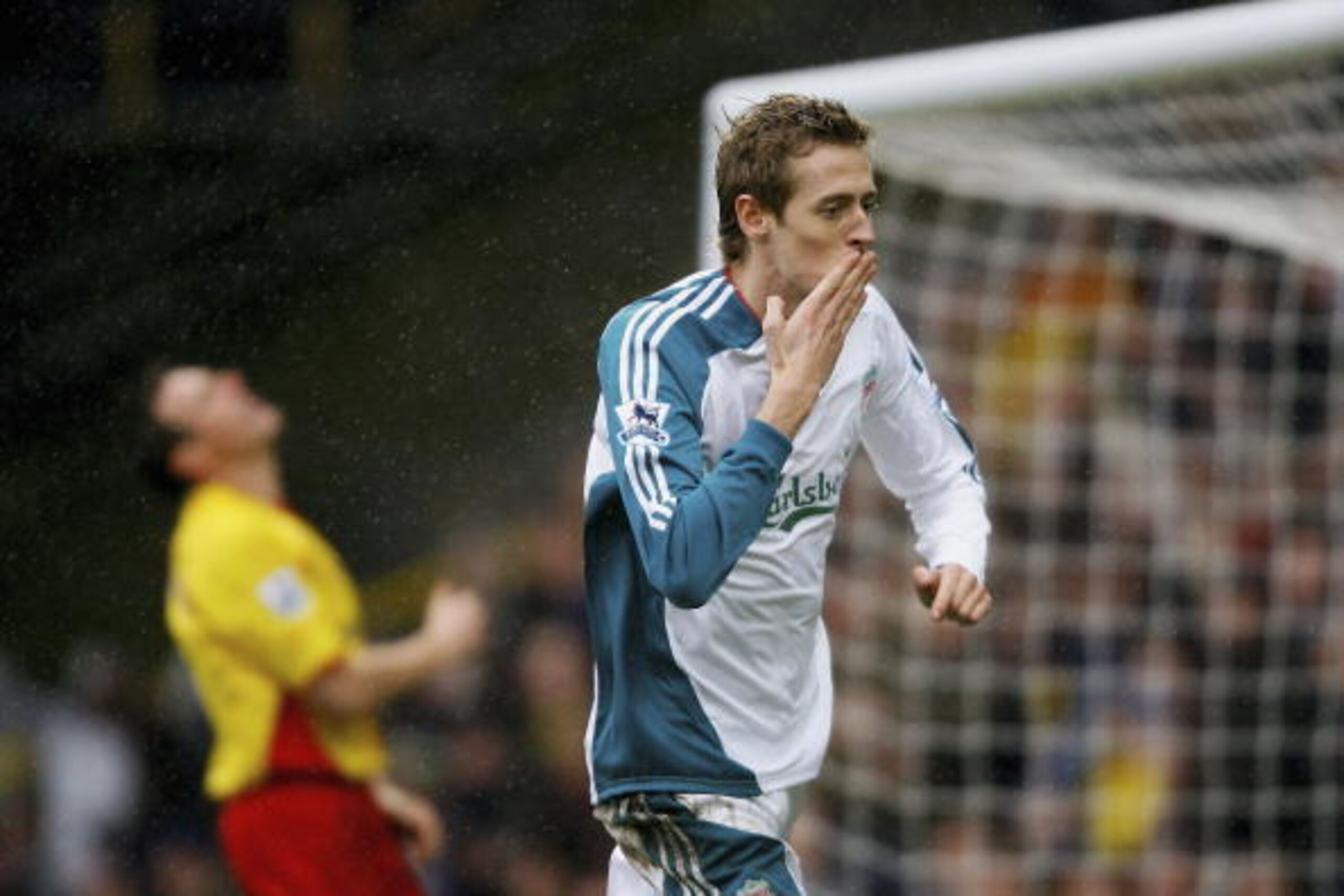 WATFORD, ENGLAND - JANUARY 13:  Liverpool striker Peter Crouch celebrates his second goal during the Barclays Premiership match between Watford and Liverpool at Vicarage Road on January 13, 2007 in Watford, England.  (Photo by Stu Forster/Getty Images)