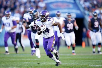 CHICAGO, IL - NOVEMBER 1: Stefon Diggs #14 of the Minnesota Vikings breaks free for a 40-yard touchdown reception to tie the game against the Chicago Bears at Soldier Field on November 1, 2015 in Chicago, Illinois. The Vikings defeated the Bears 23-20. (P