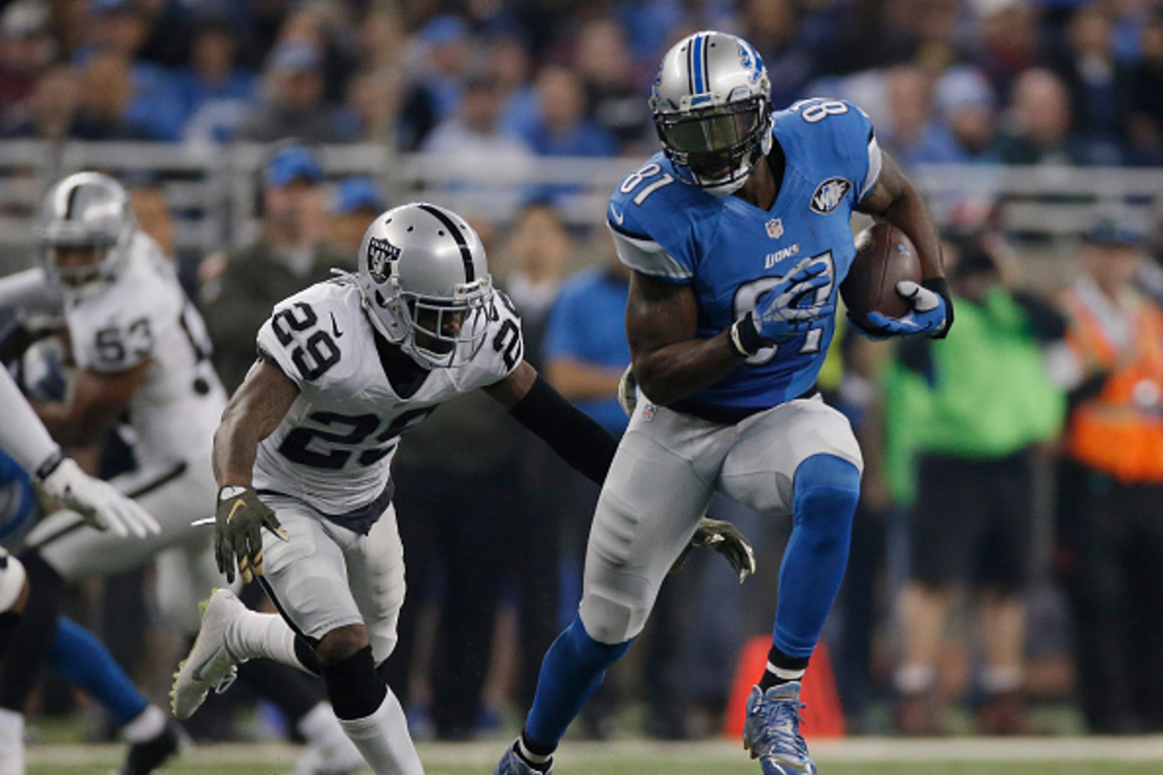 DETROIT, MI - NOVEMBER 22: Calvin Johnson #81 of the Detroit Lions runs his 700th reception in the second quarter while playing the Oakland Raiders, becoming the first in franchise history to reach 700 receptions  at Ford Field on November 22, 2015 in Det