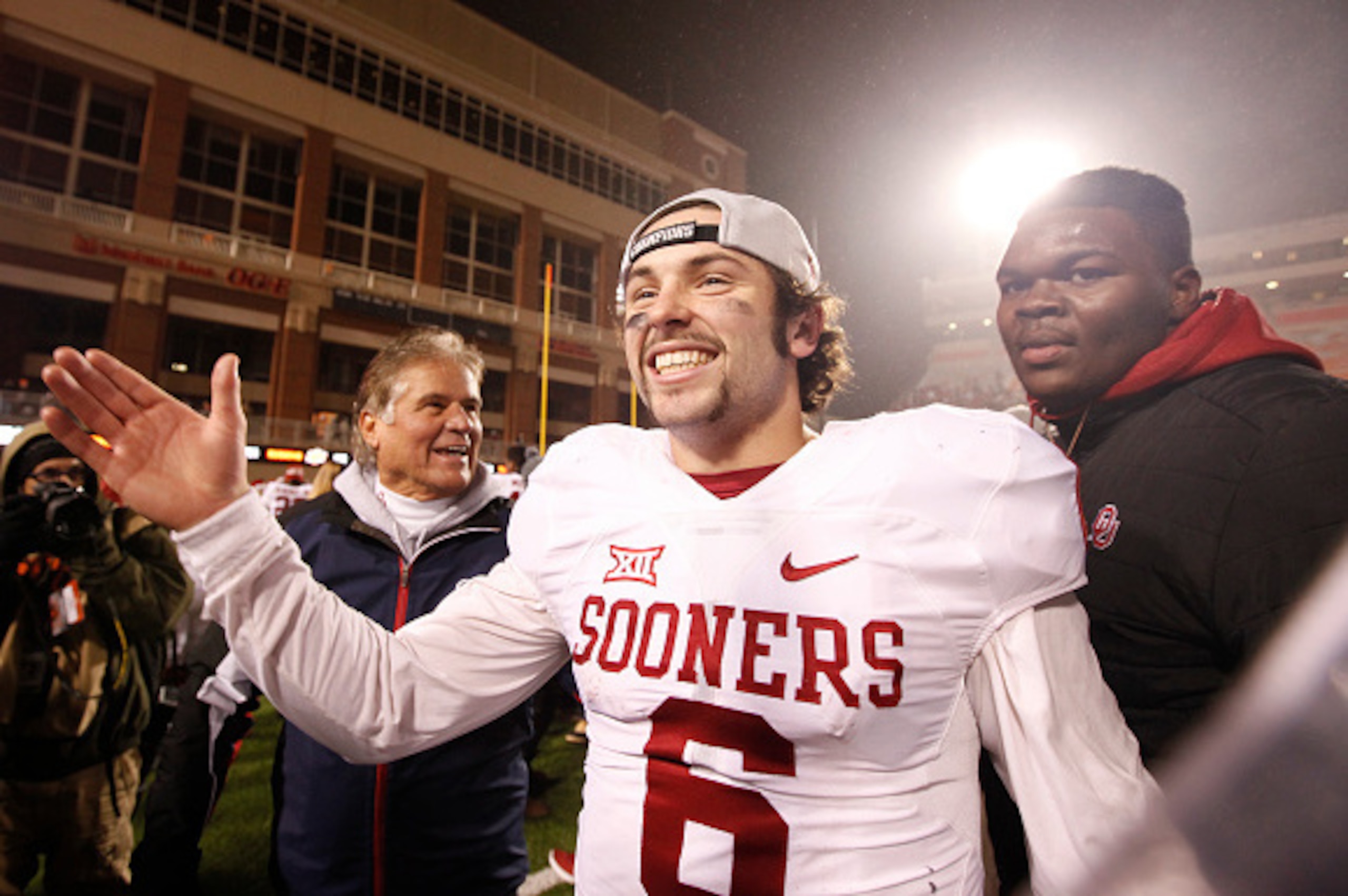 STILLWATER, OK - NOVEMBER 28 : Quarterback Baker Mayfield #6 of the Oklahoma Sooners celebrates after the game against the Oklahoma State Cowboys November 28, 2015 at Boone Pickens Stadium in Stillwater, Oklahoma. Oklahoma defeated Oklahoma State 58-23.(P