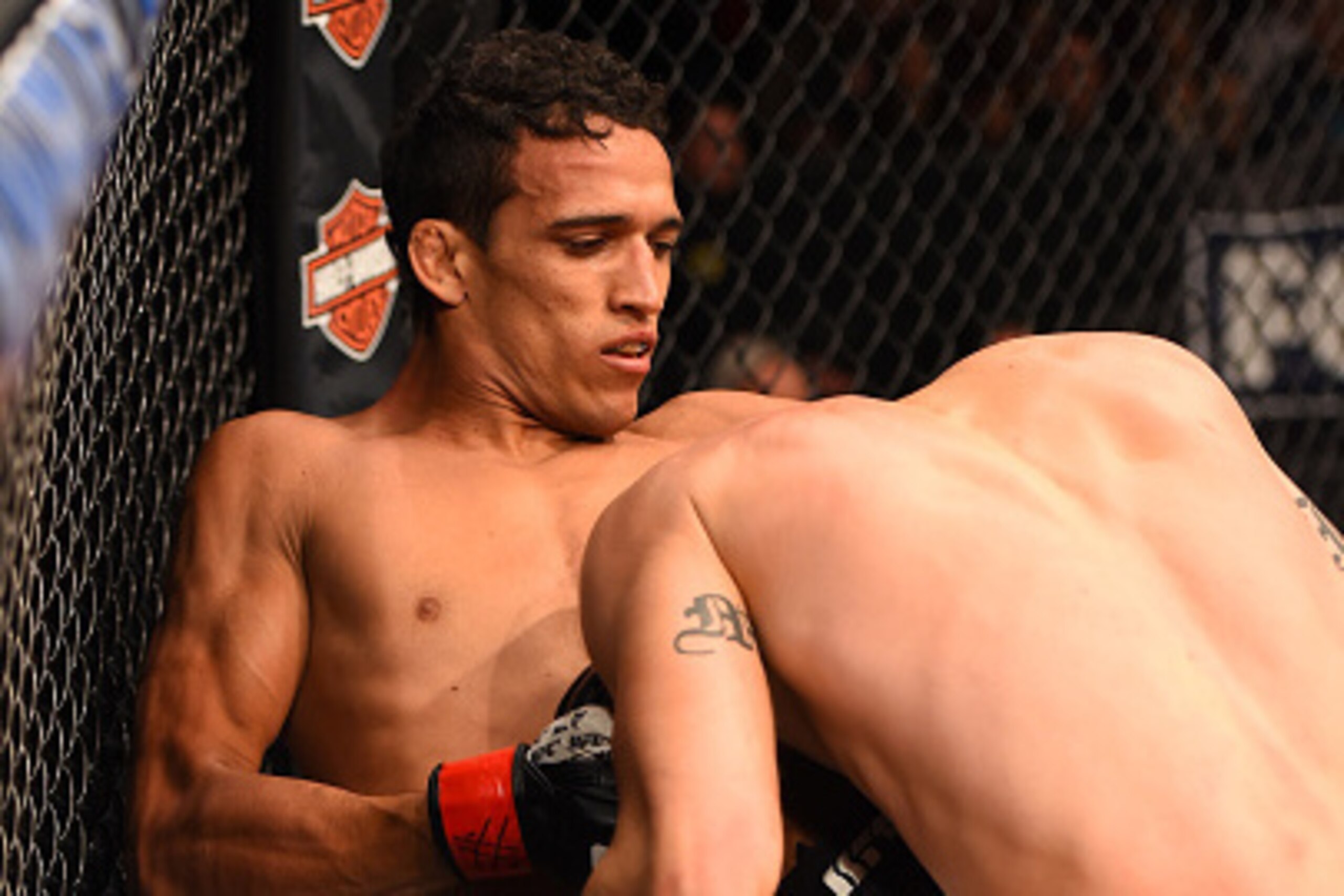 ORLANDO, FL - DECEMBER 19:   (L-R) Charles Oliveira attempts to submit Myles Jury in their featherweight bout during the UFC Fight Night event at the Amway Center on December 19, 2015 in Orlando, Florida. (Photo by Josh Hedges/Zuffa LLC/Zuffa LLC via Gett