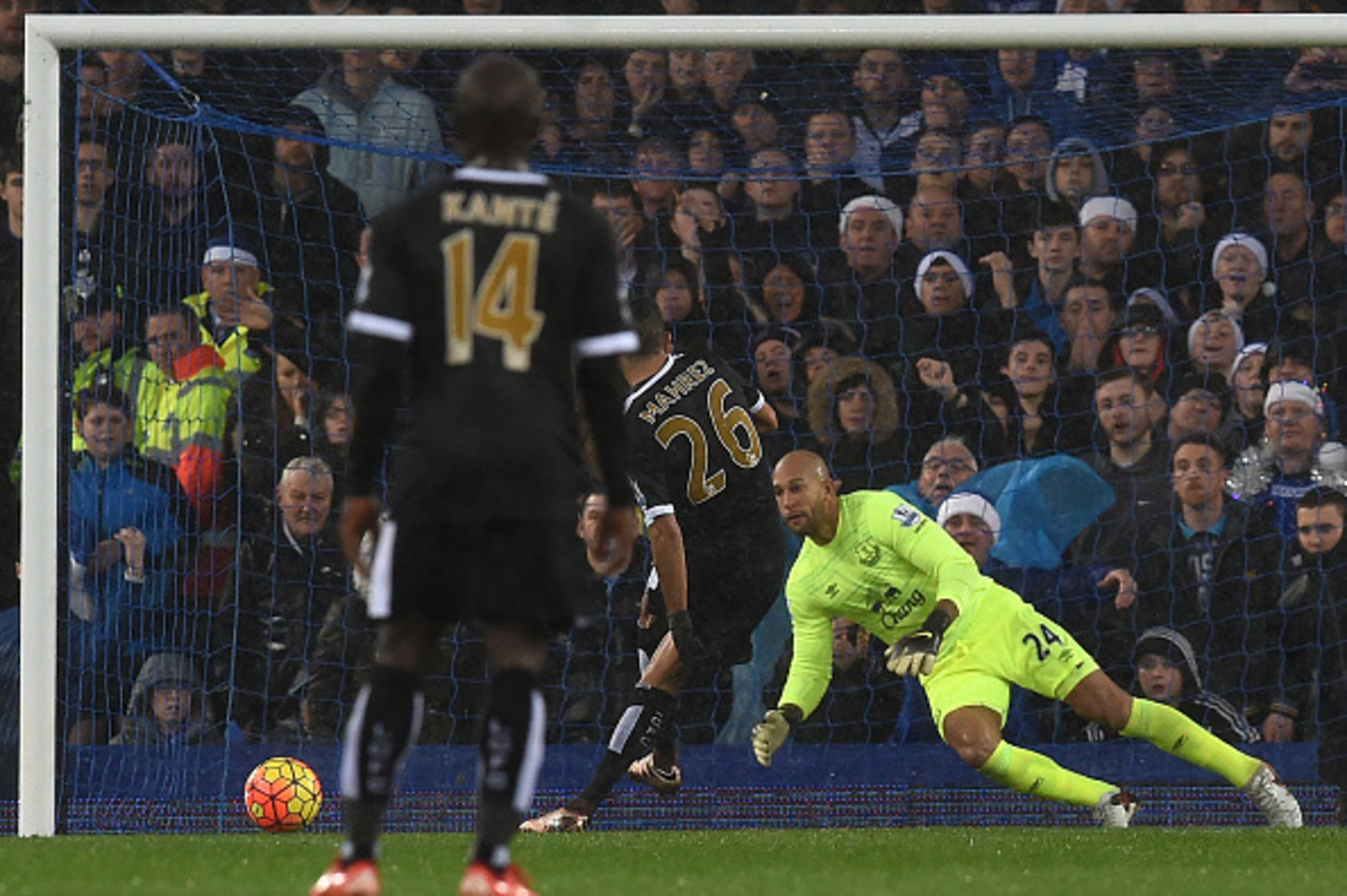 Leicester City's Algerian midfielder Riyad Mahrez (2nd R) scores a penalty past Everton's US goalkeeper Tim Howard to open the scoring in the English Premier League football match between Everton and Leicester City at Goodison Park in Liverpool, north wes