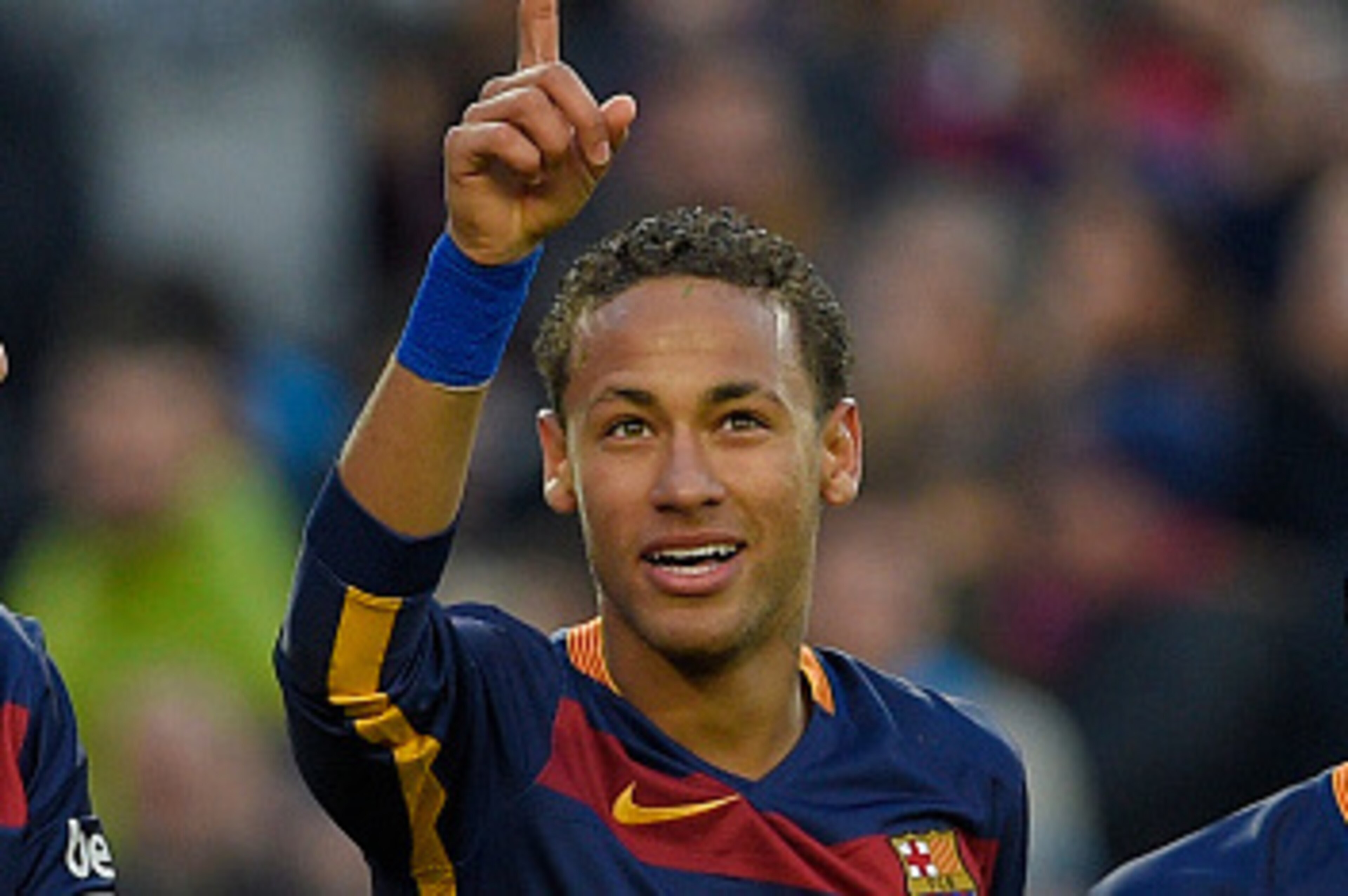Barcelona's Brazilian forward Neymar (C) celebrates with Barcelona's Uruguayan forward Luis Suarez (L) and Barcelona's Argentinian forward Lionel Messi after scoring their third goal during the Spanish league football match FC Barcelona vs Real Sociedad d