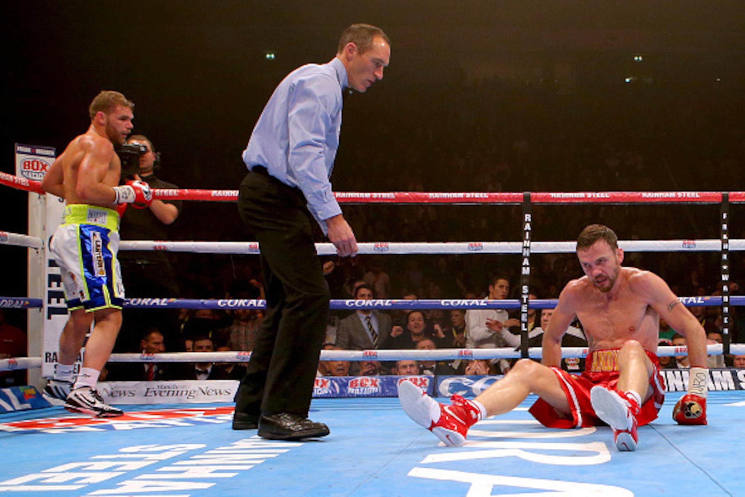 MANCHESTER, ENGLAND - DECEMBER 19: Andy Lee is floored for the first time by Billy Joe Saunders during their WBO World Middleweight title fight at the Manchester Arena on December 19, 2015 in Manchester, England. (Photo by Dave Thompson/Getty Images)